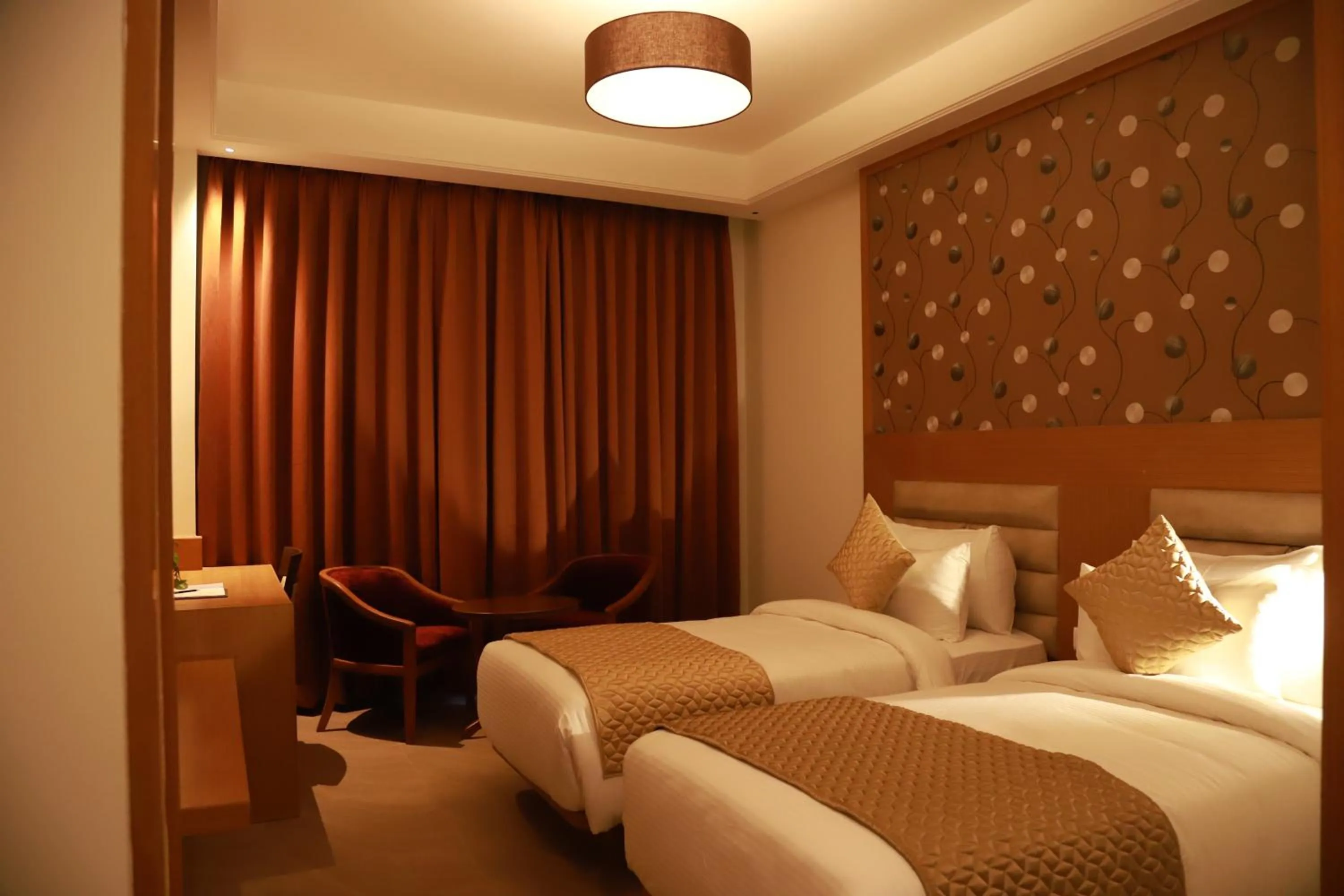 Bed in Clarion Inn Indore