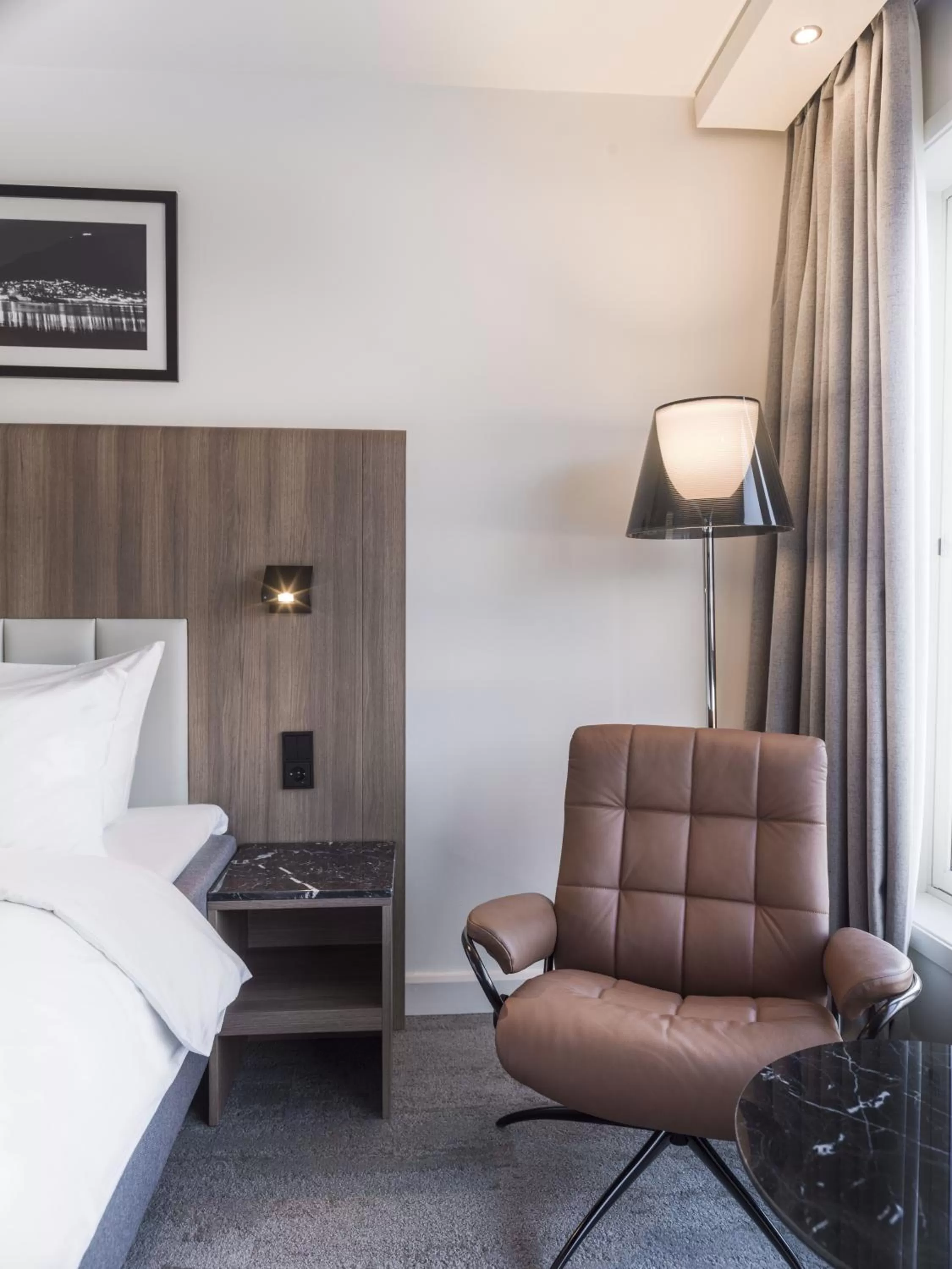 Seating area, Bed in Radisson Blu Hotel Tromsø