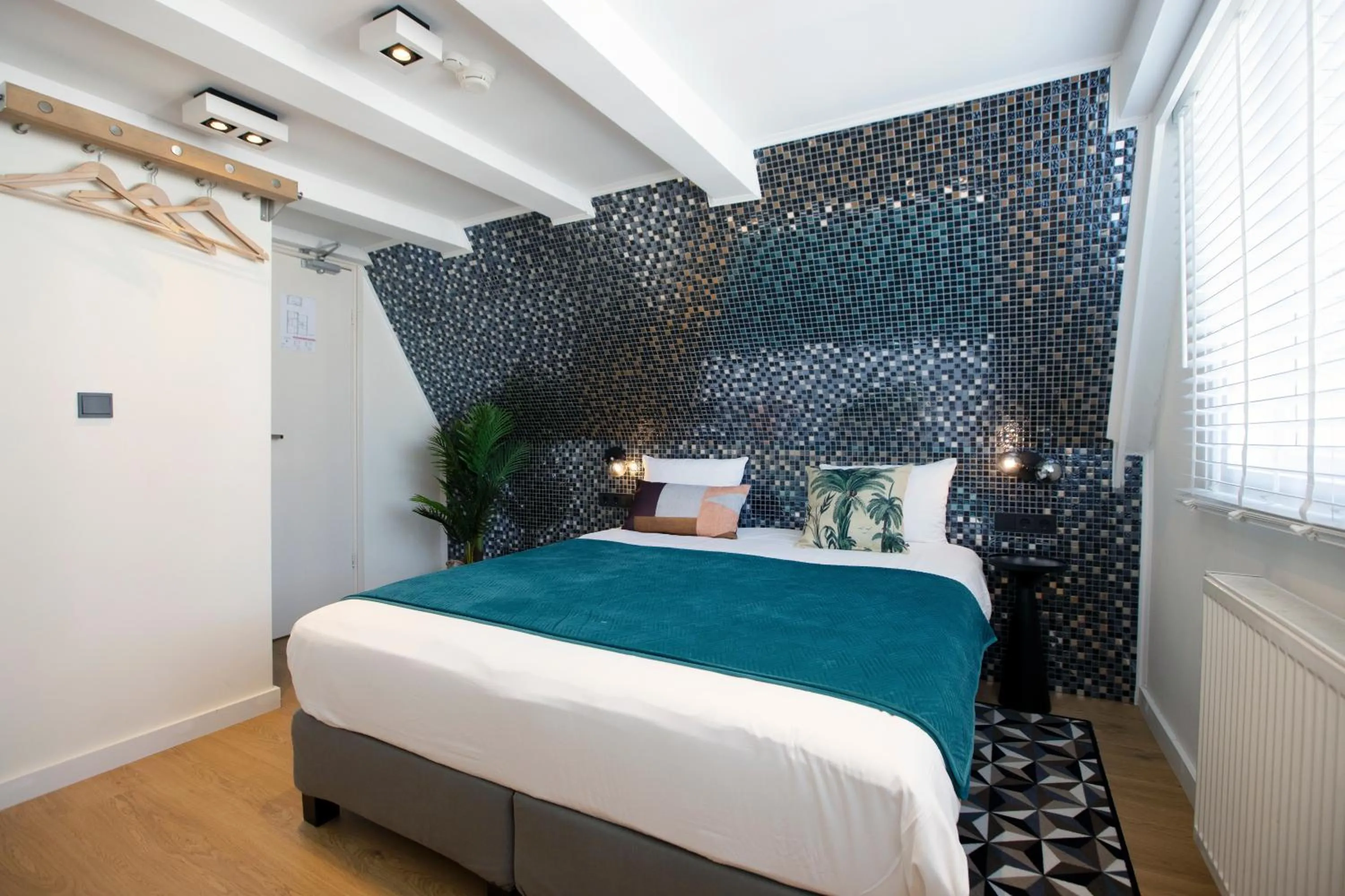 Bed in Quentin Golden Bear Hotel