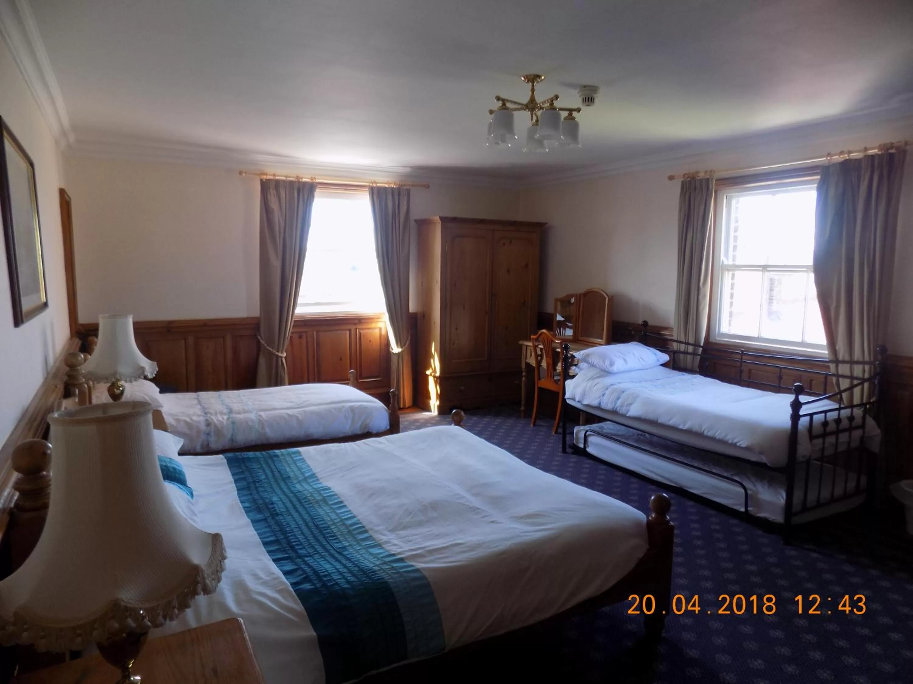 Bed in The Londesborough Arms bar with en-suite rooms