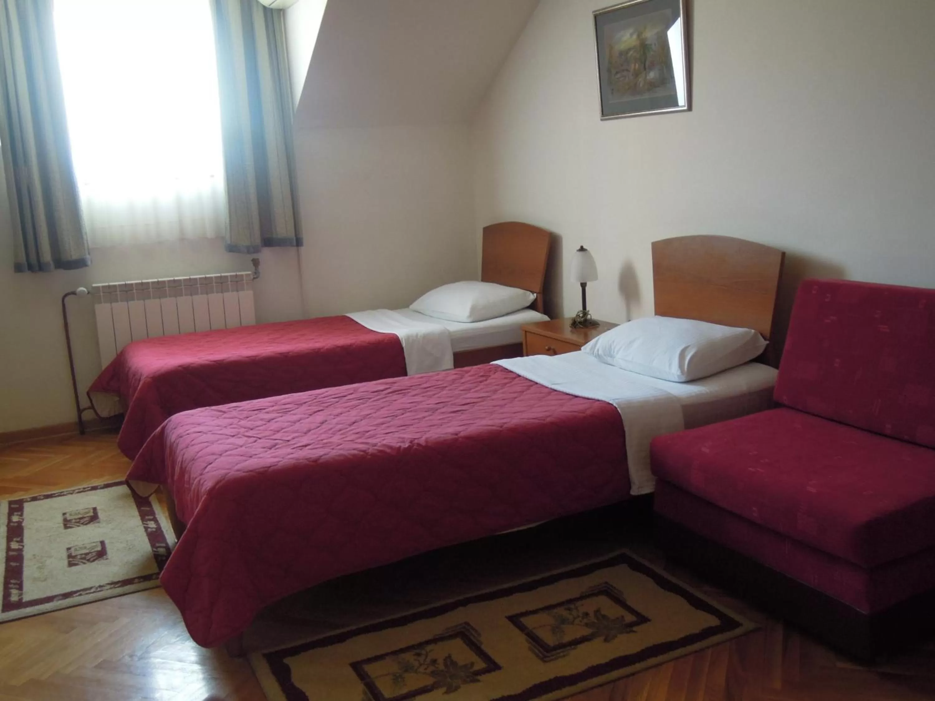 Bed in Hotel Sucevic Garni