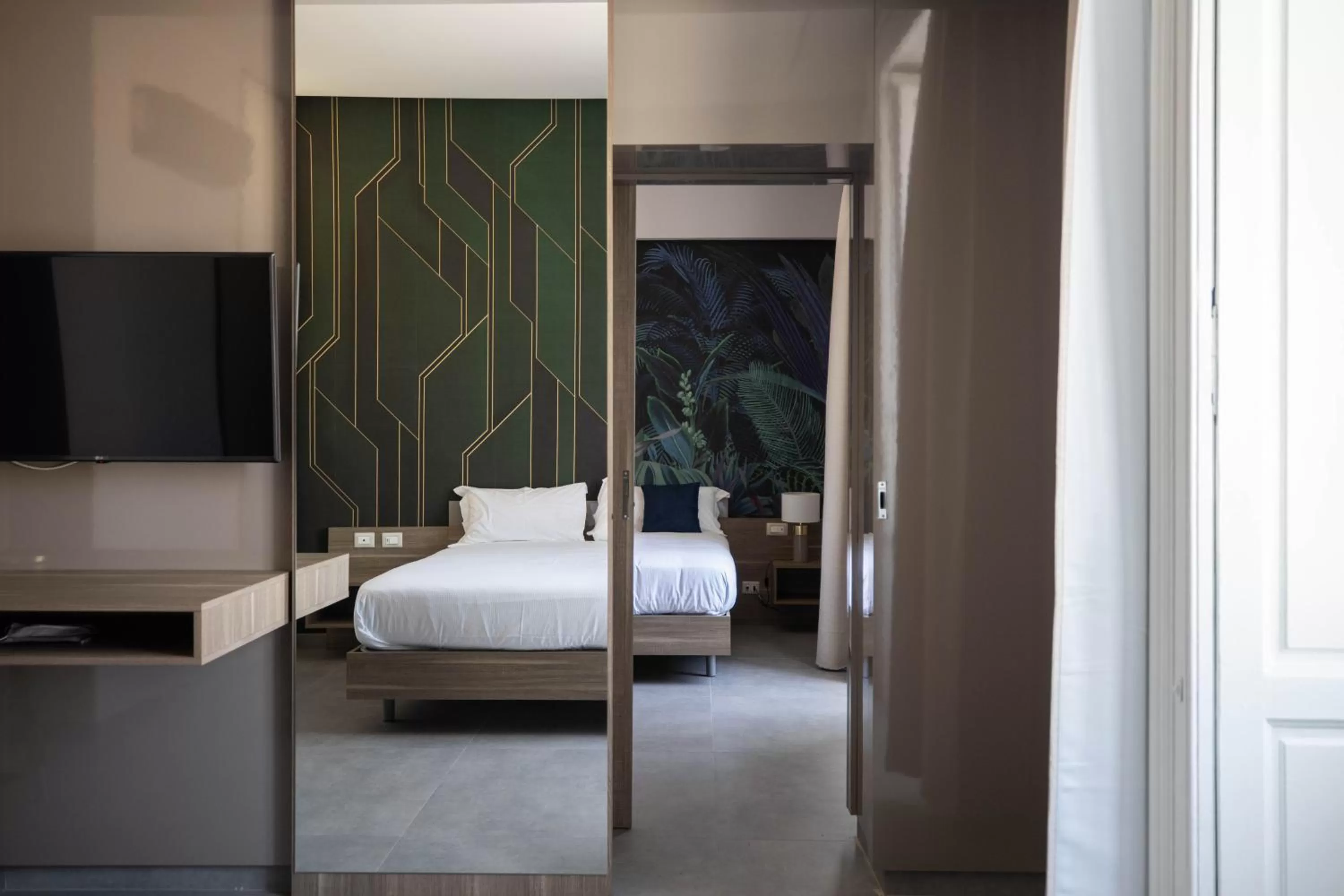 Bed in L'élégant BOUTIQUE ROOMS NAPLES