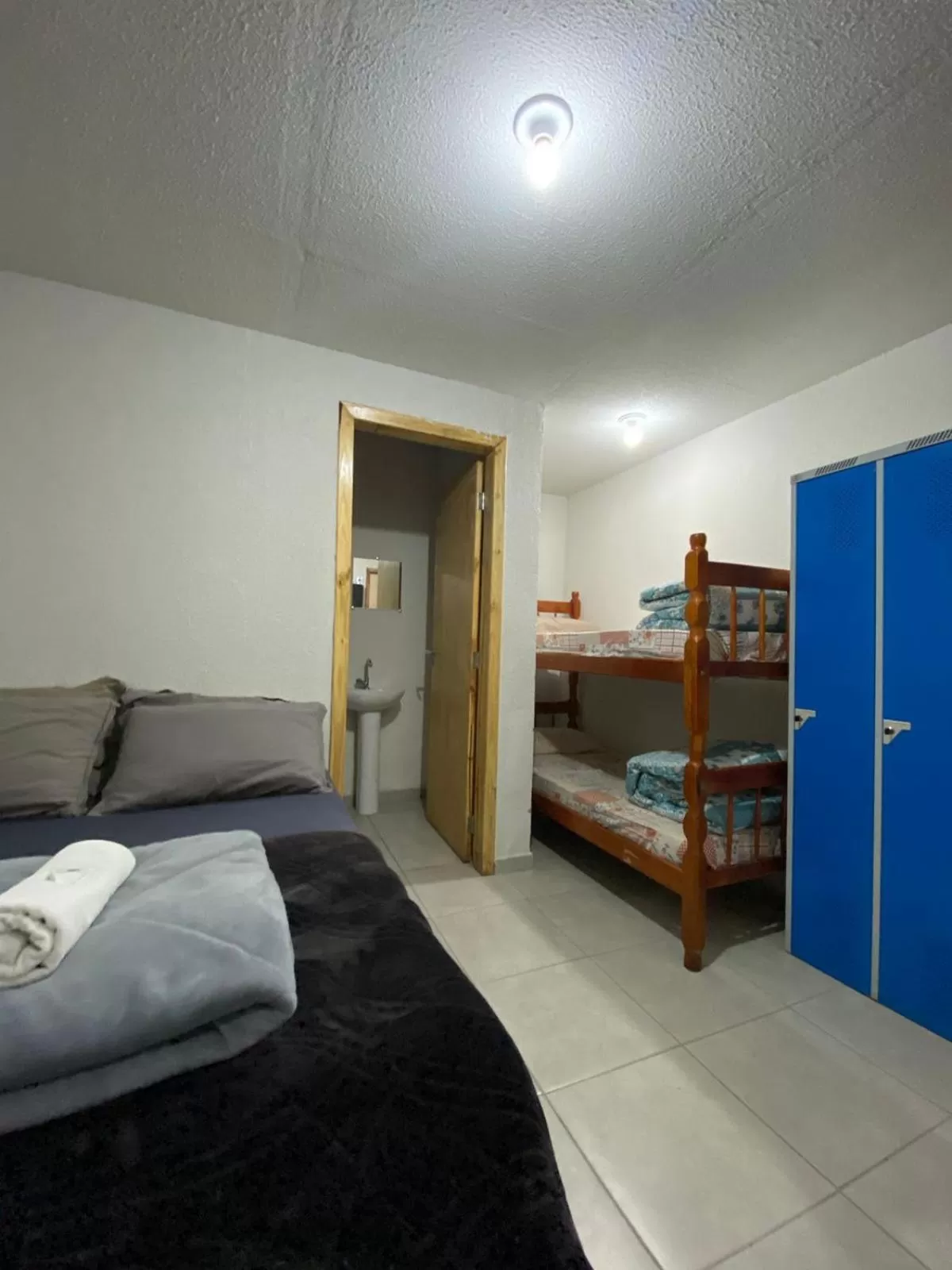 Bed in Nova Pousada Consulado