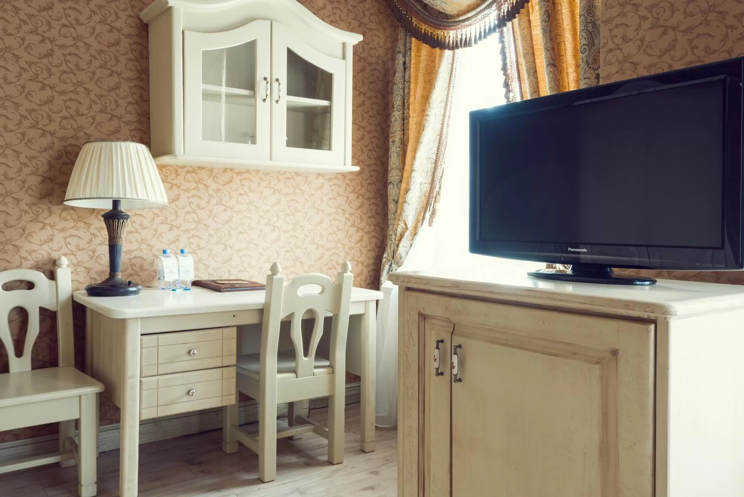 Living room, TV/Entertainment Center in Boutique Hotel Traditional