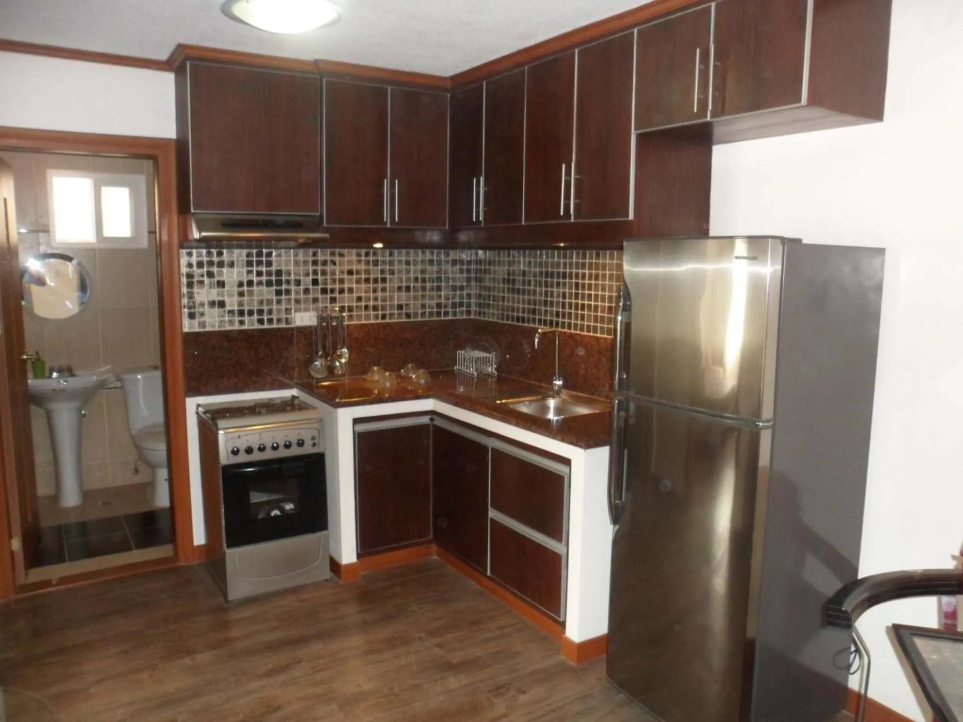 Kitchen or kitchenette in Prestige Vacation Apartments - Bonbel Condominium