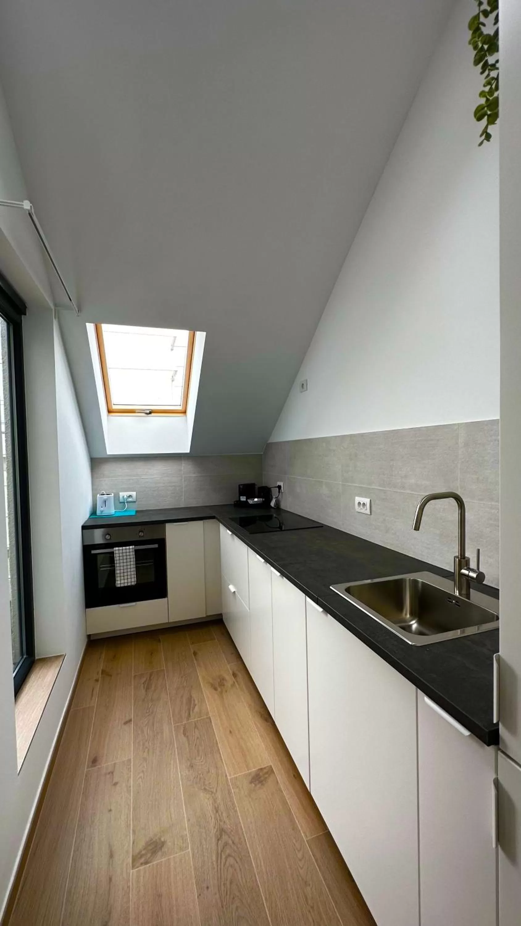 kitchen in OneLuxStay near Fashion District