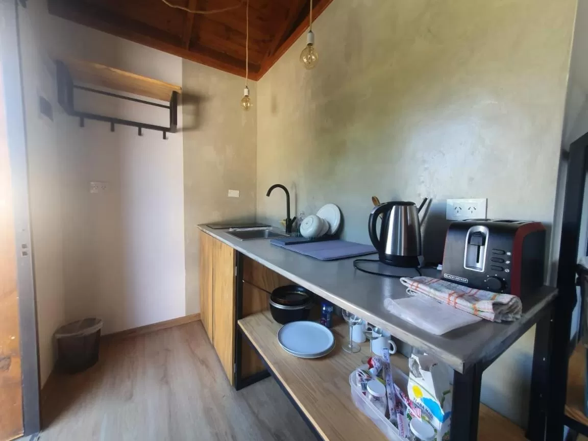 Kitchen/Kitchenette in Trastienda Guest House