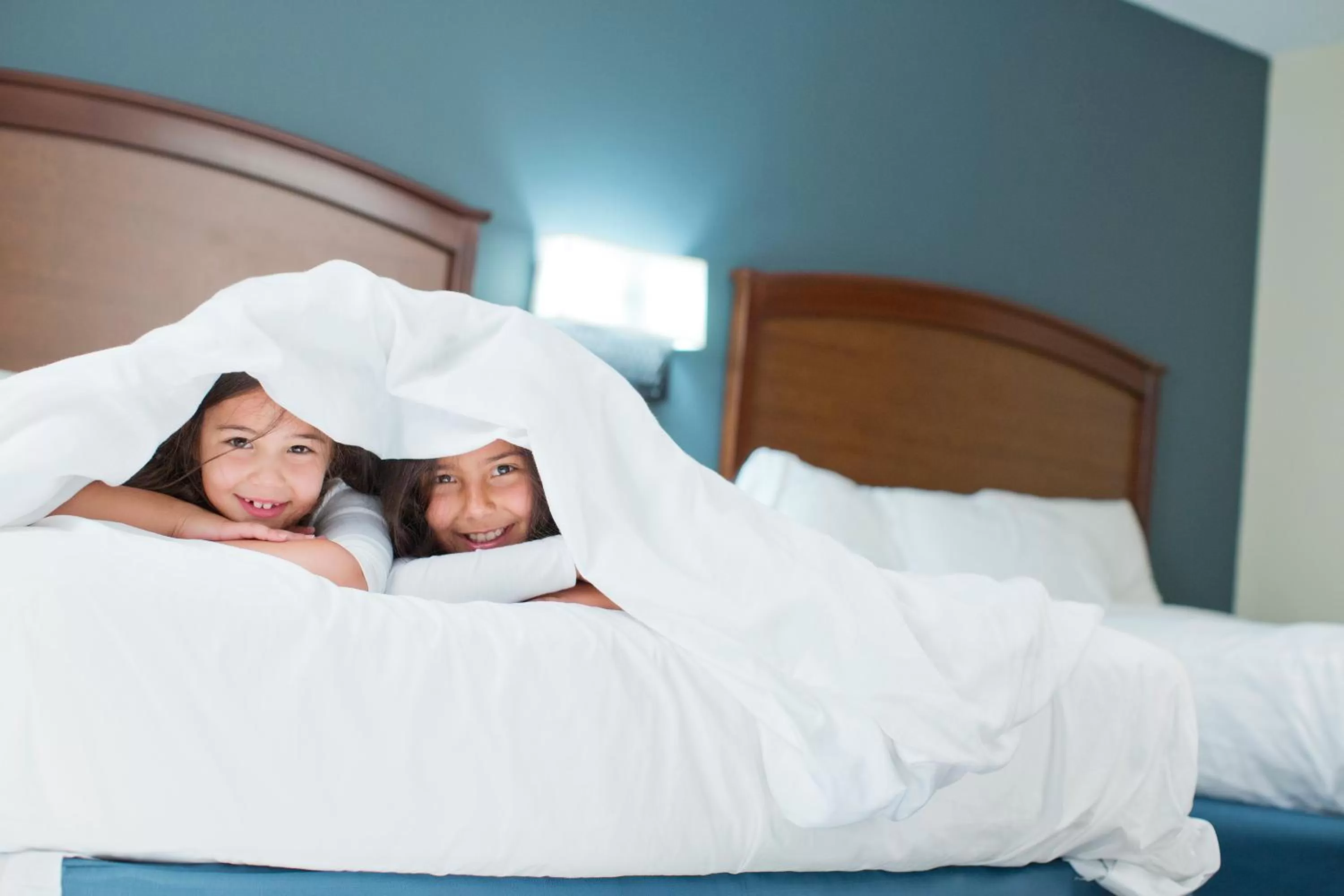 Bed in AmericInn by Wyndham Clear Lake