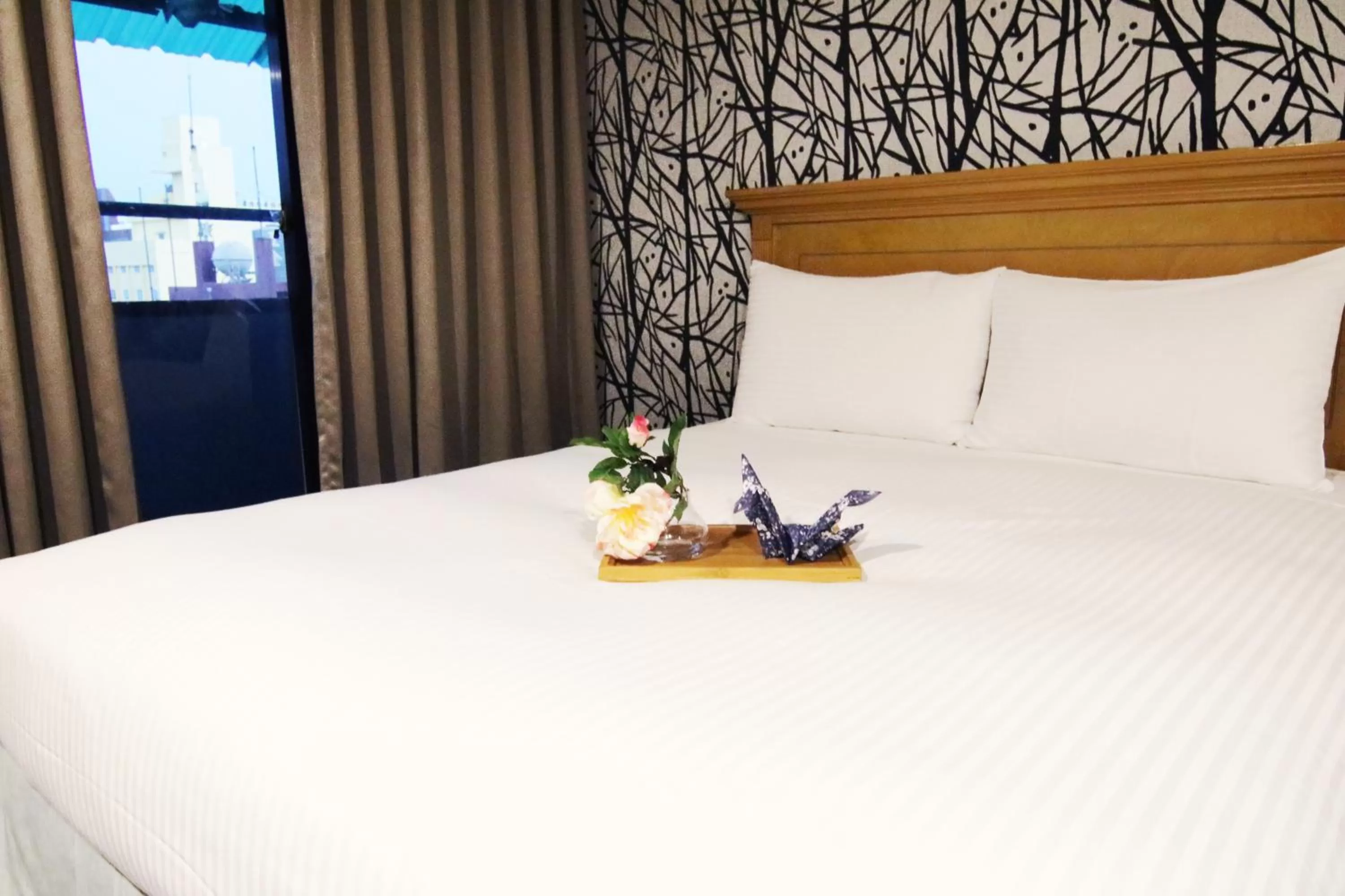 Bed in LIHO Hotel Tainan