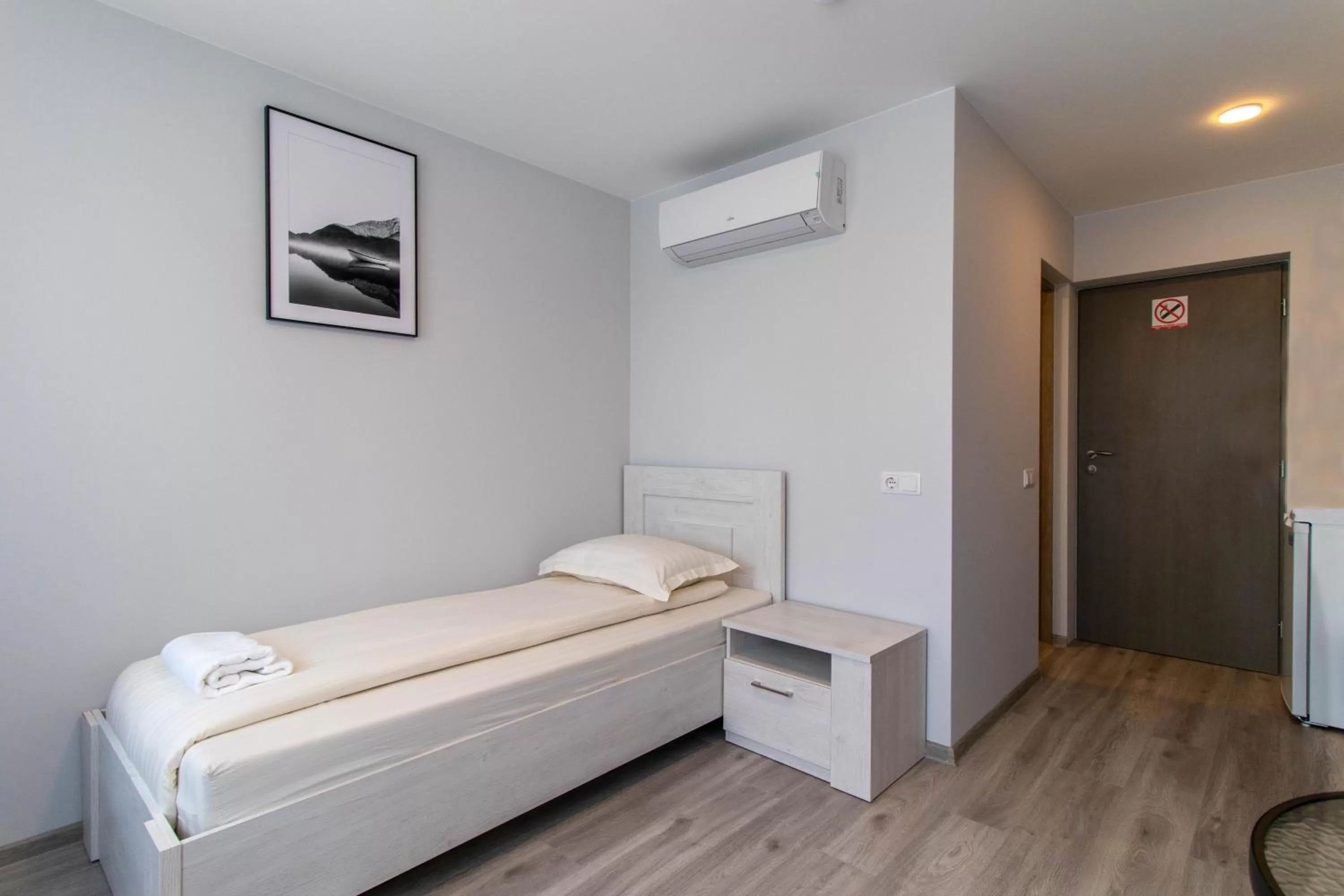 Bed in Dzukija Hotel