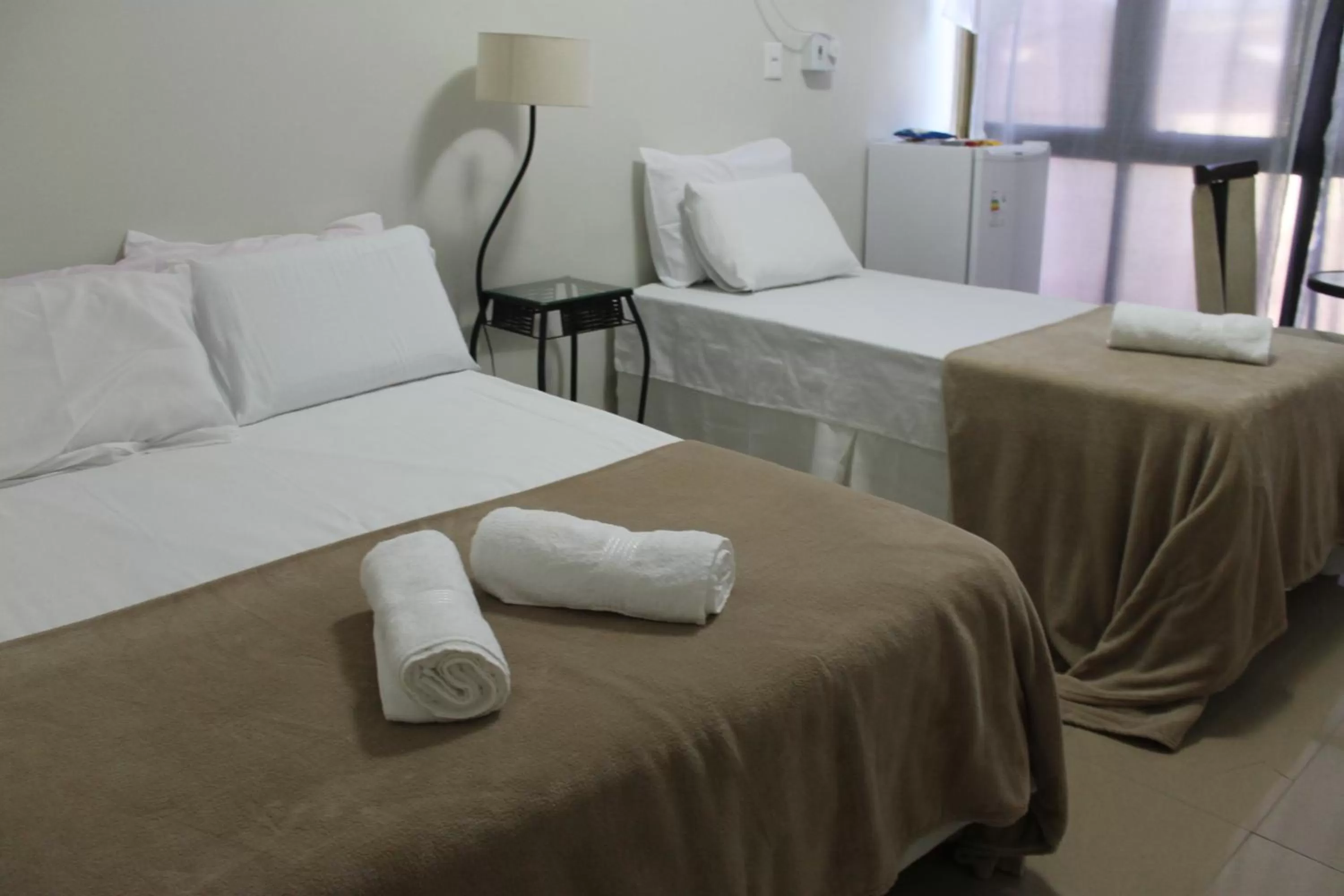 Bed in Pousada Das Palmeiras