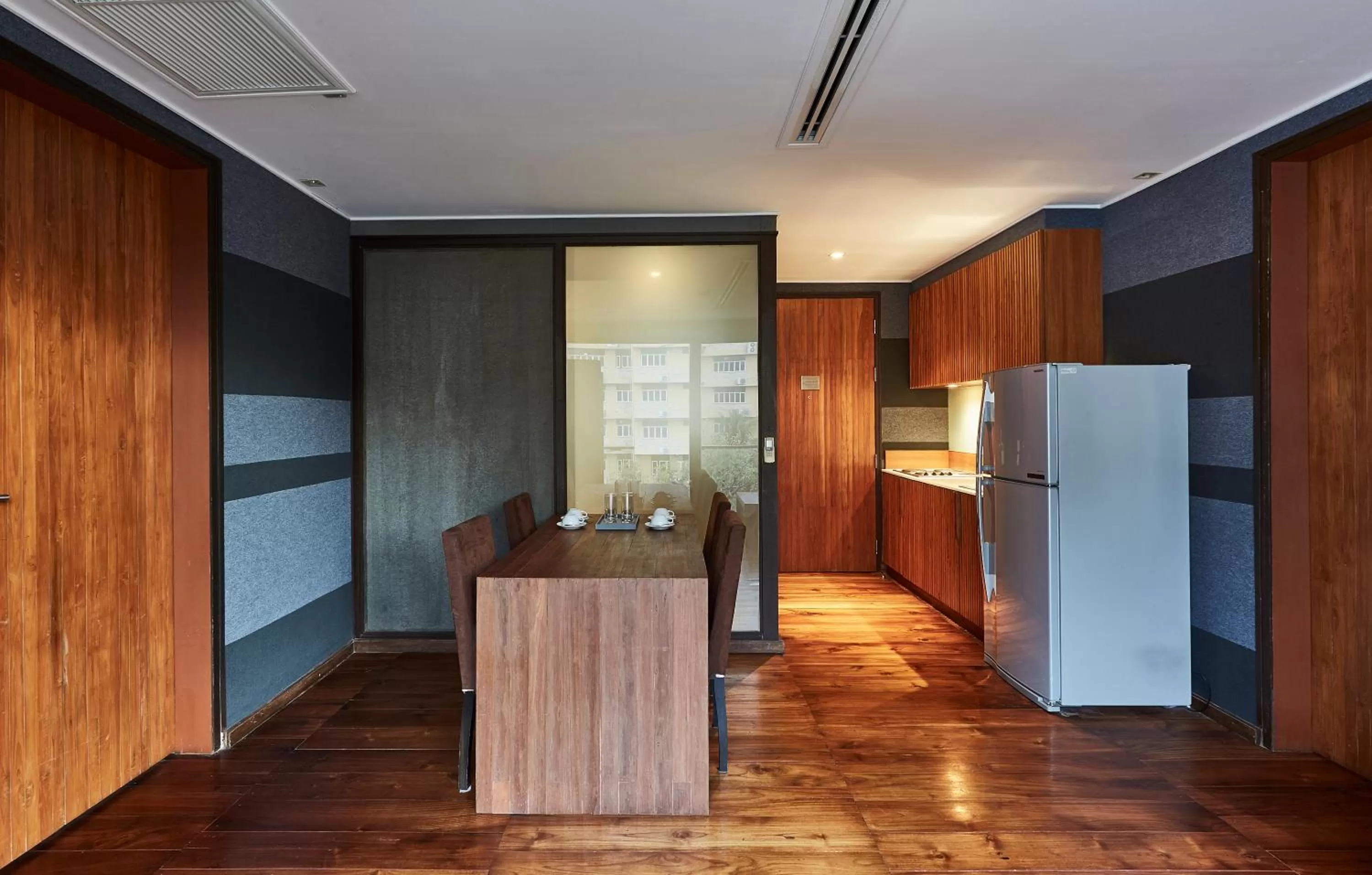 Kitchen or kitchenette in LUXX Langsuan Hotel - SHA Plus