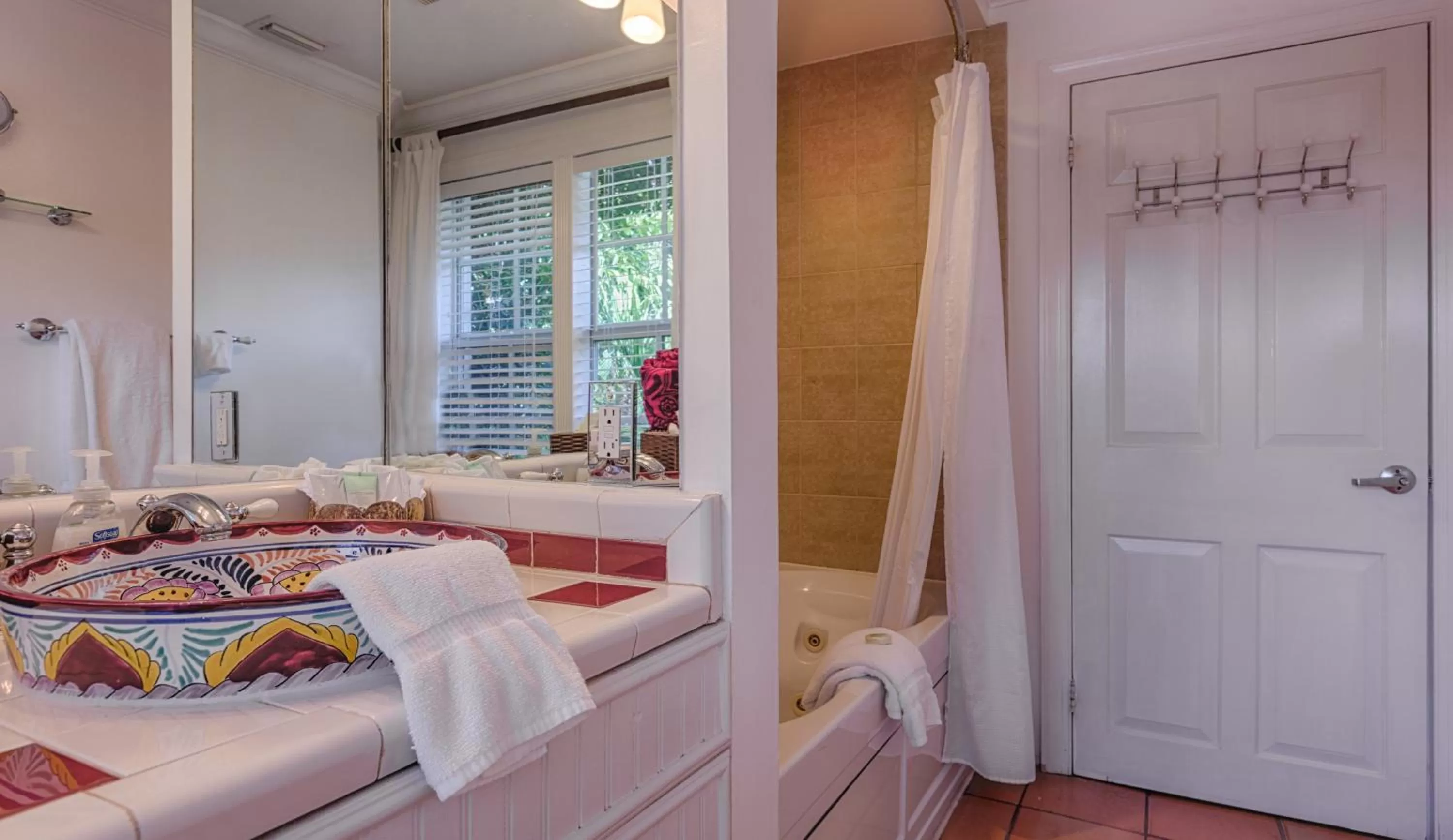 Bathroom, Bed in The Caribbean Court Boutique Hotel