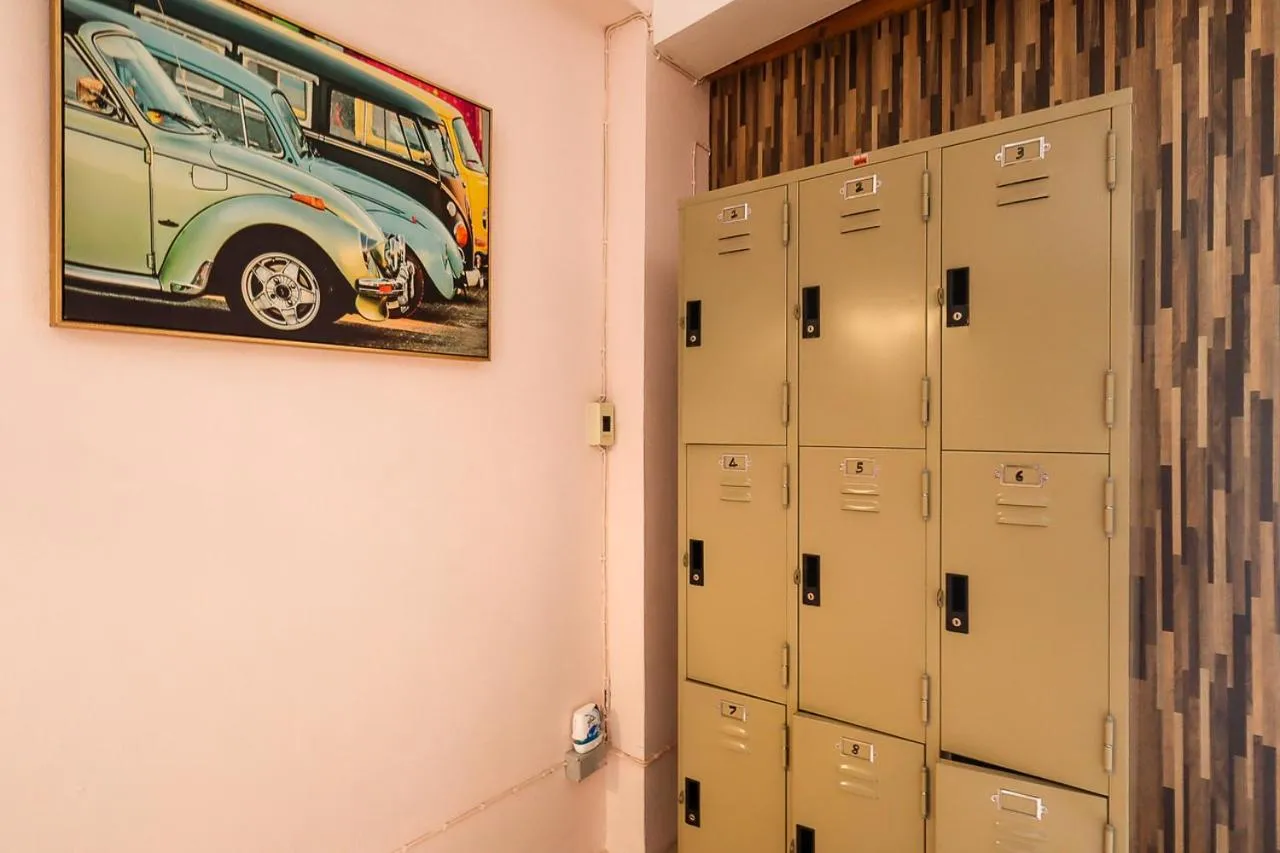 microwave in The Cabin Backpackers Hostel & Bar