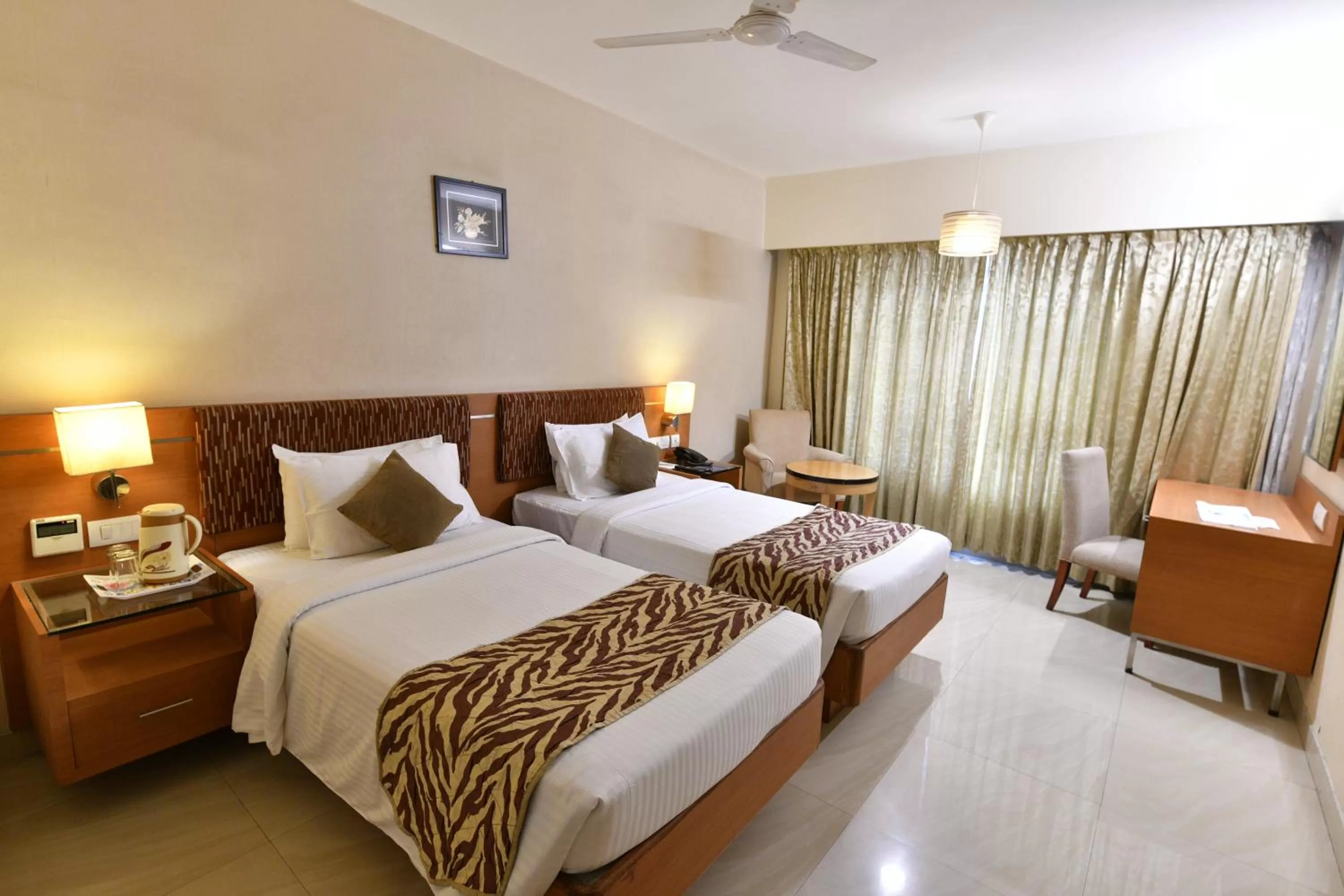 Bed in PLA Krishna Inn