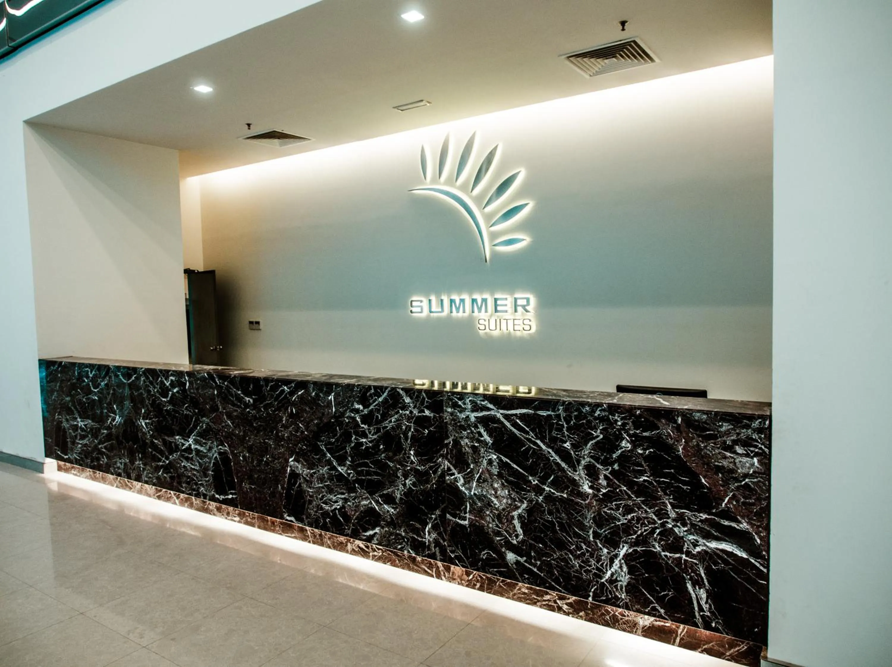 Lobby or reception in Summer Suites Residences by Subhome