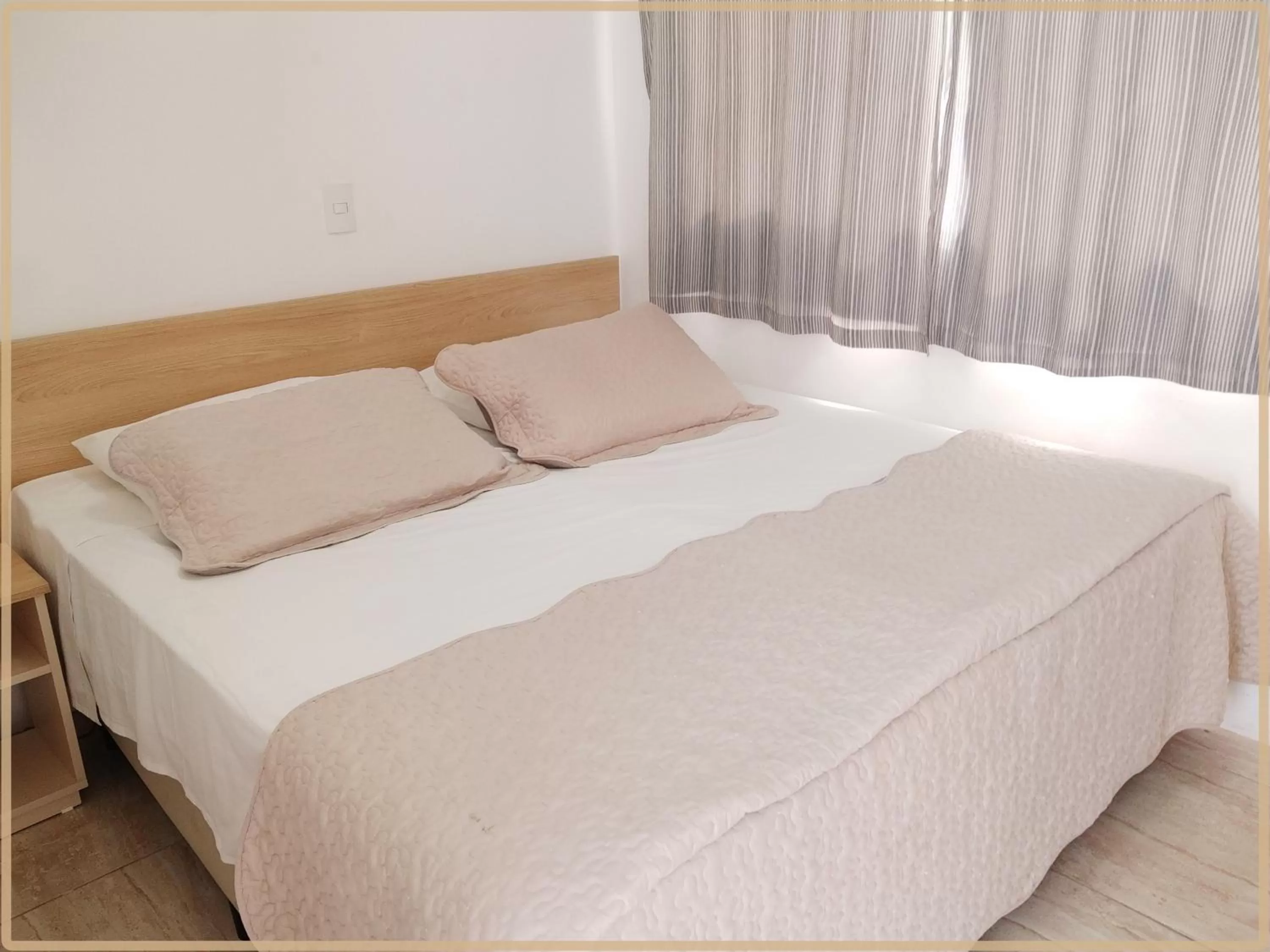 Bed in Hotel Anjos LTDA
