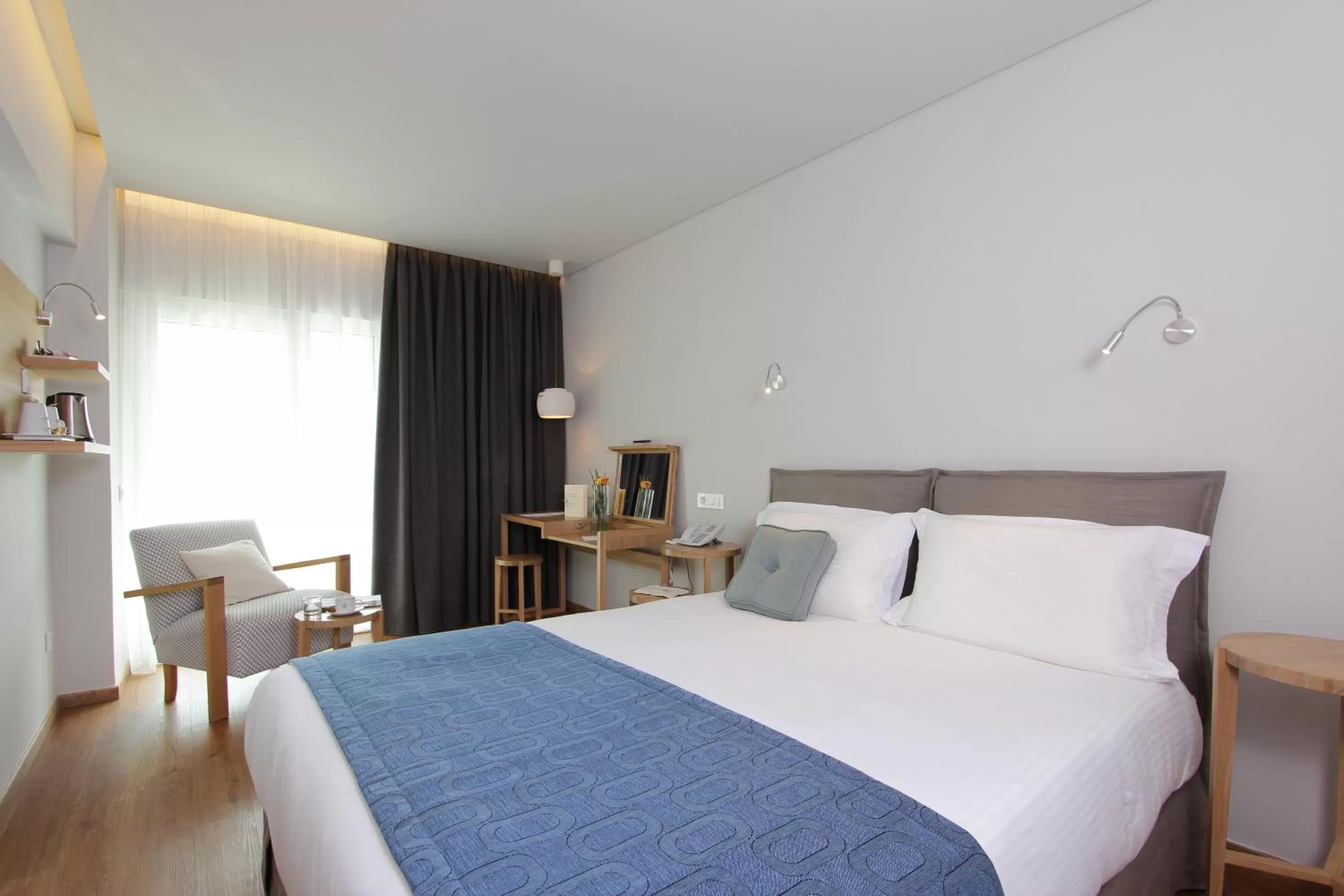 Bed in Golden Age Athens Hotel