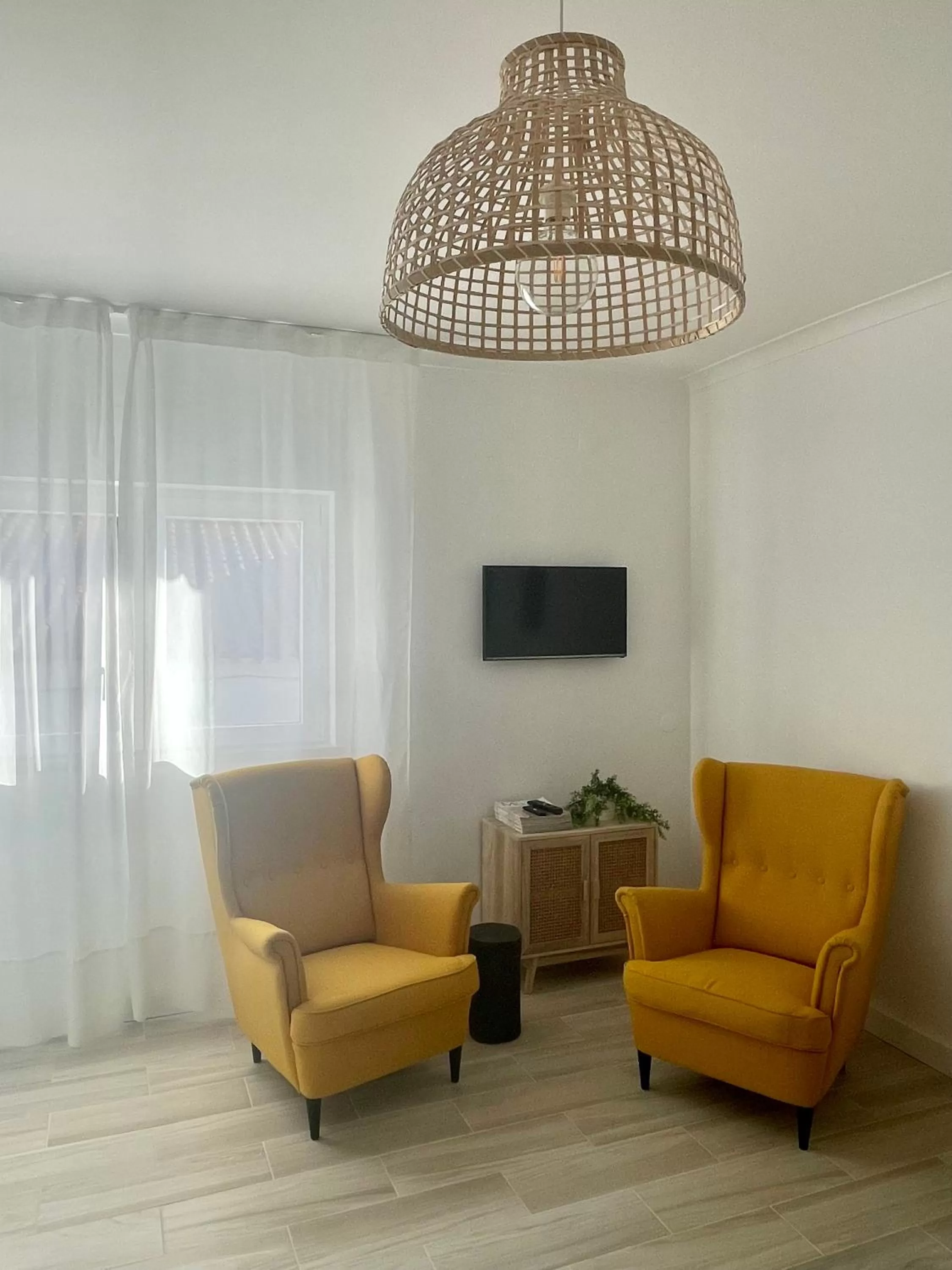 Communal lounge/ TV room, Seating Area in Galagana Charm House