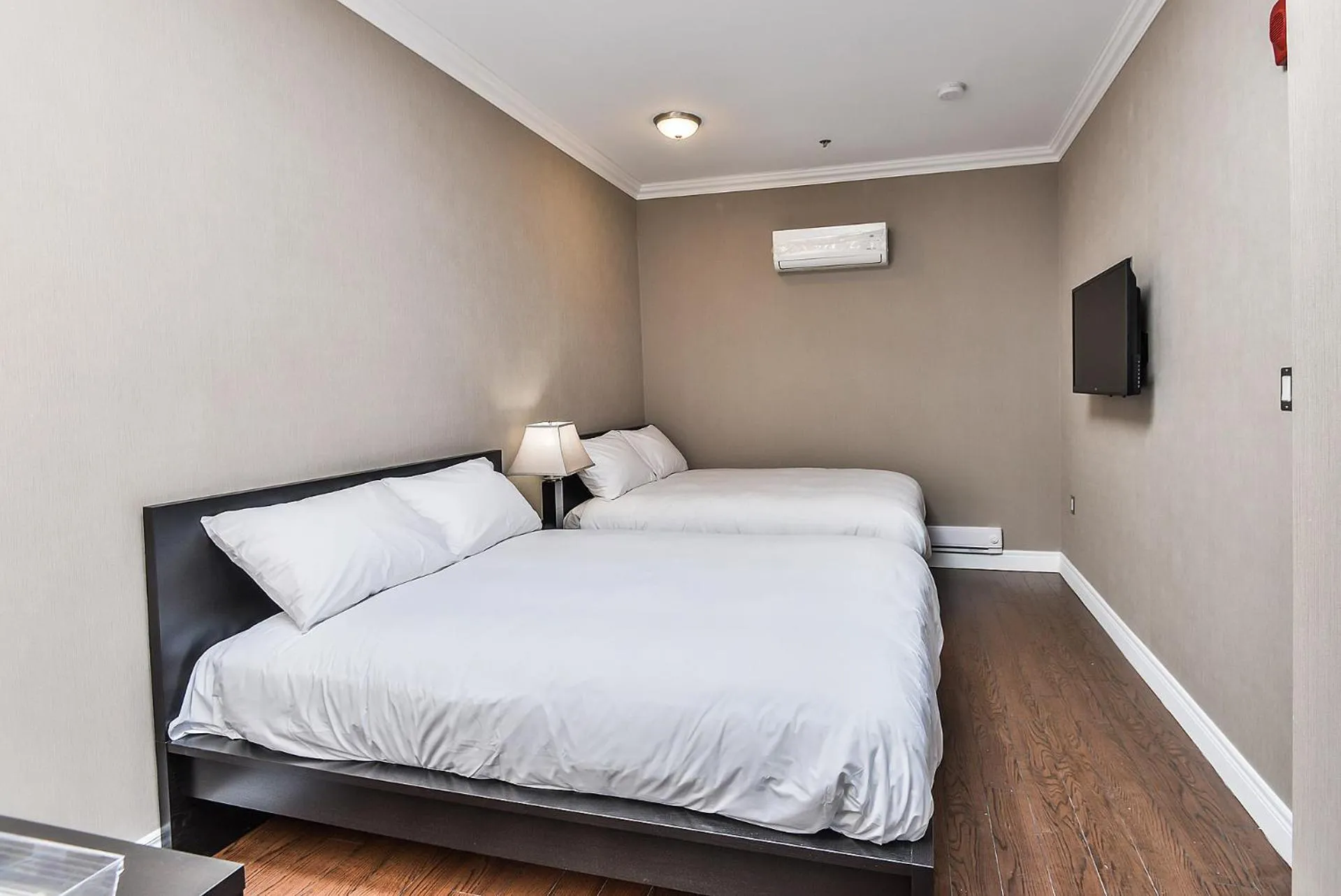 Bed in NU Hotel Toronto Airport