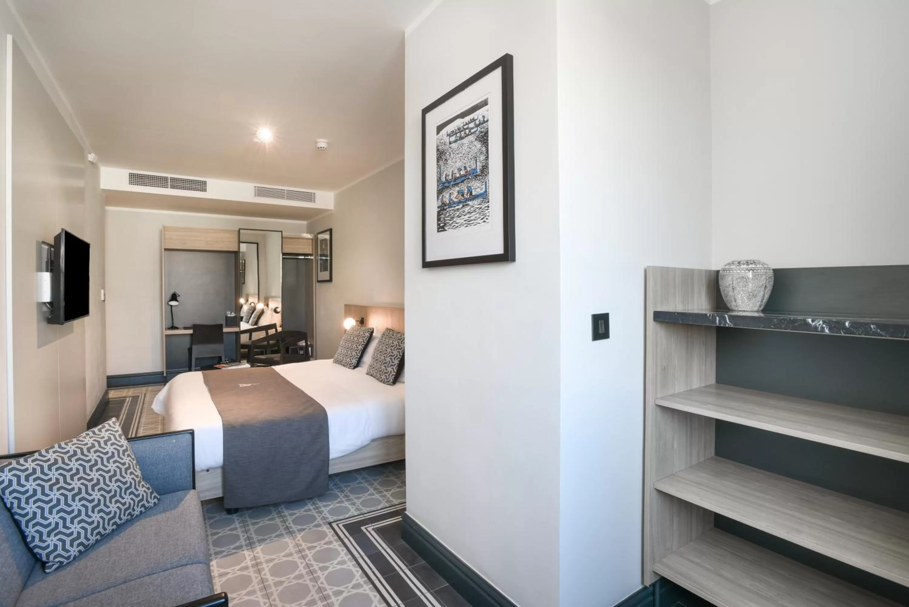 Bed in La Falconeria Hotel