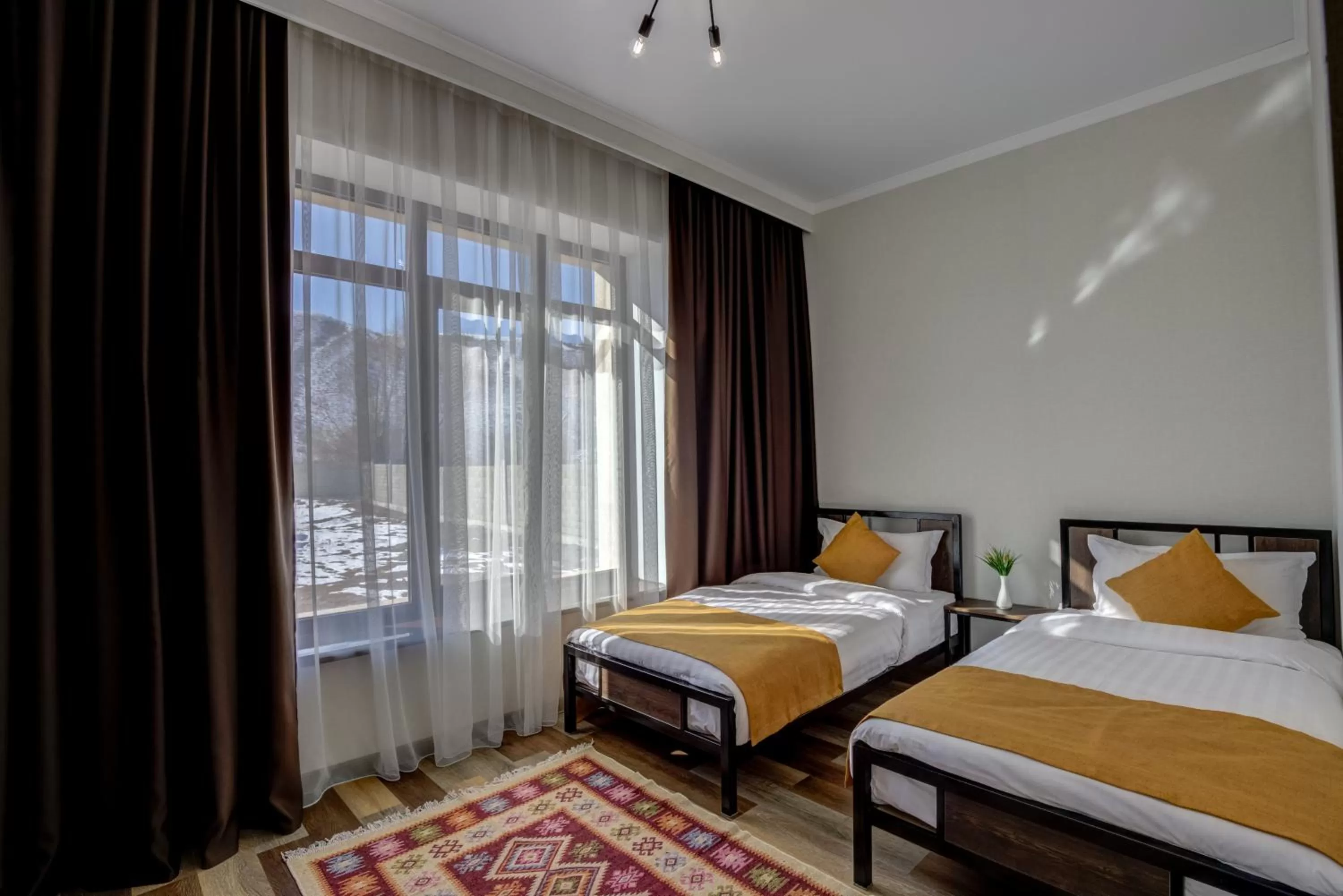 Bed in My hotel Karakol