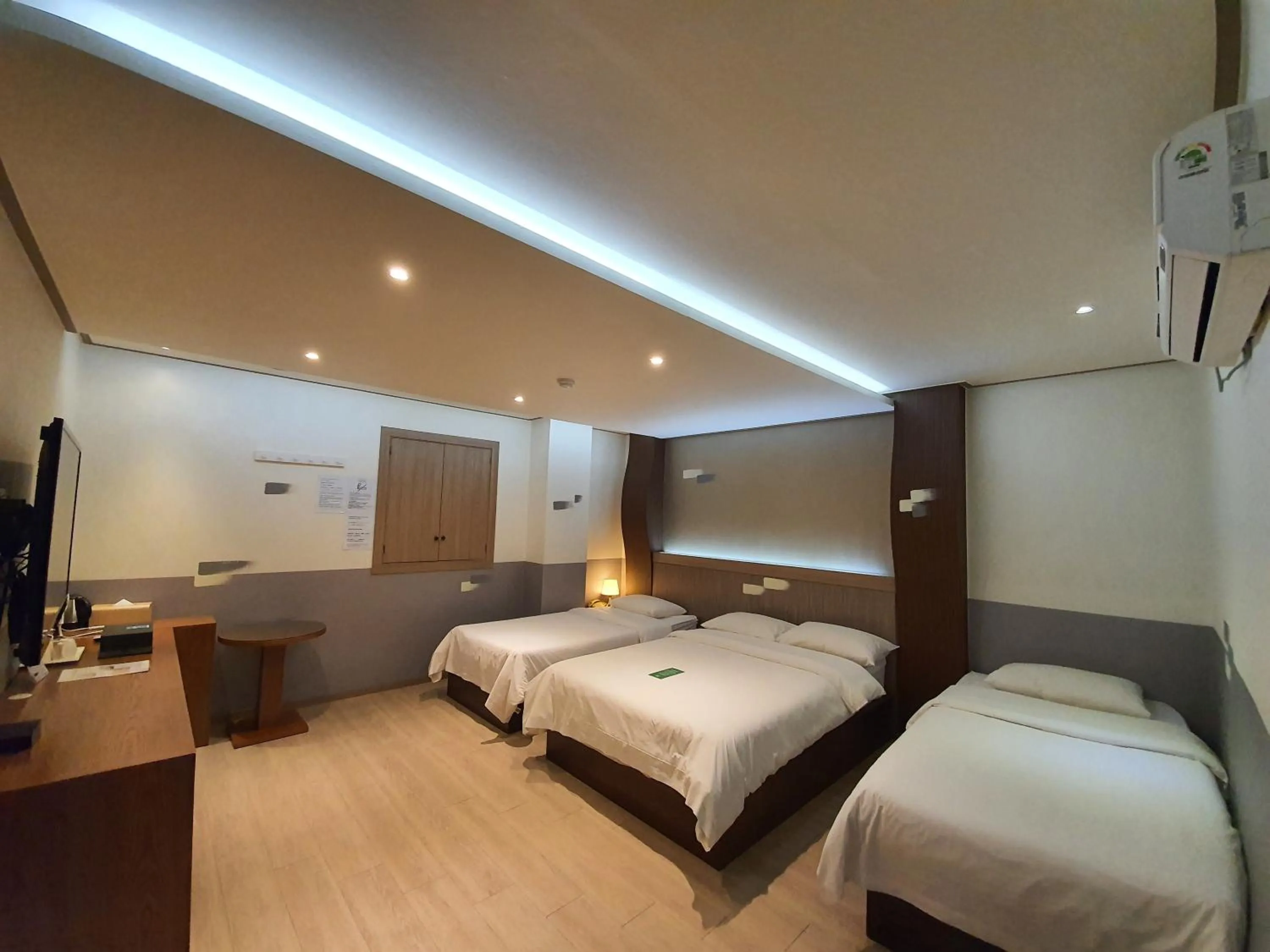 Bed in Friendly DH Naissance Hotel by Mindrum Group