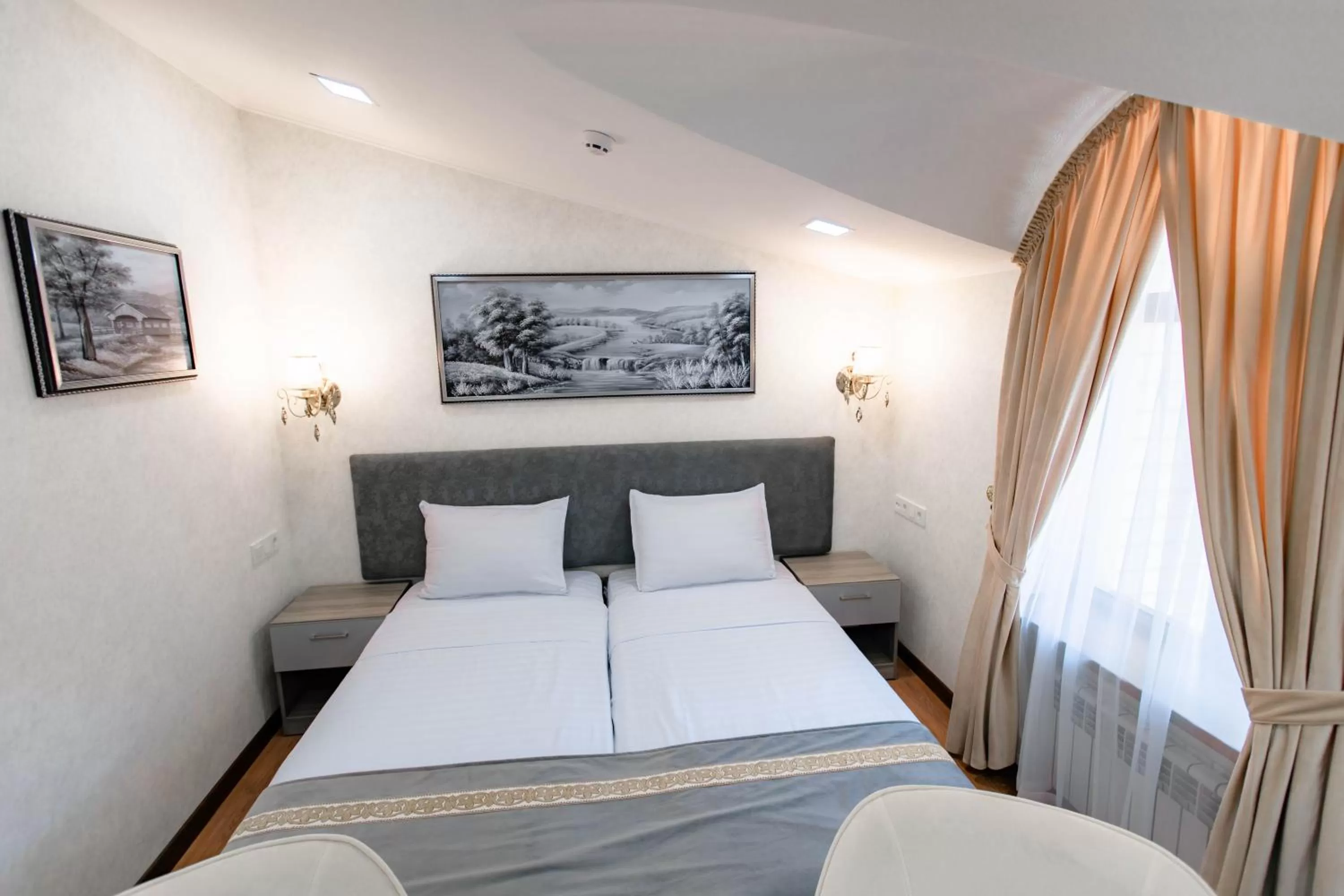 Bed in Registon Saroy Hotel