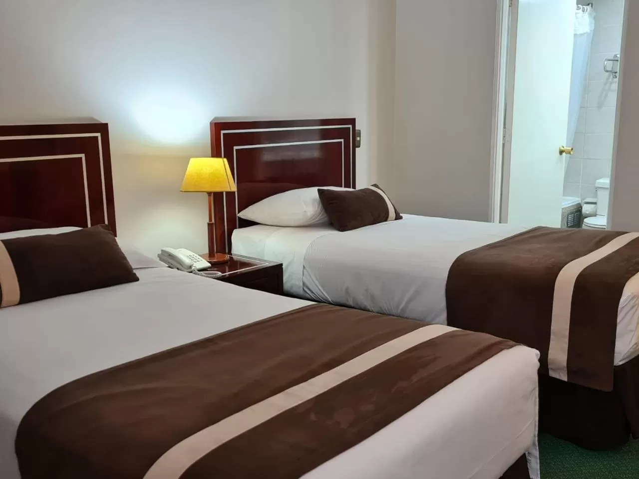 Bed in Hotel Leonardo da Vinci