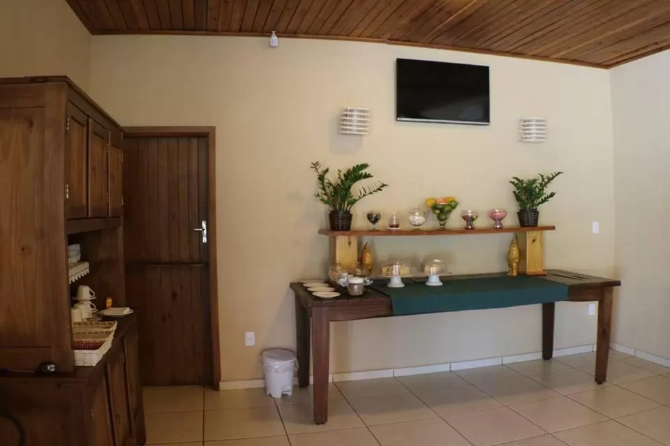 TV/Entertainment Center in Pousada Manna