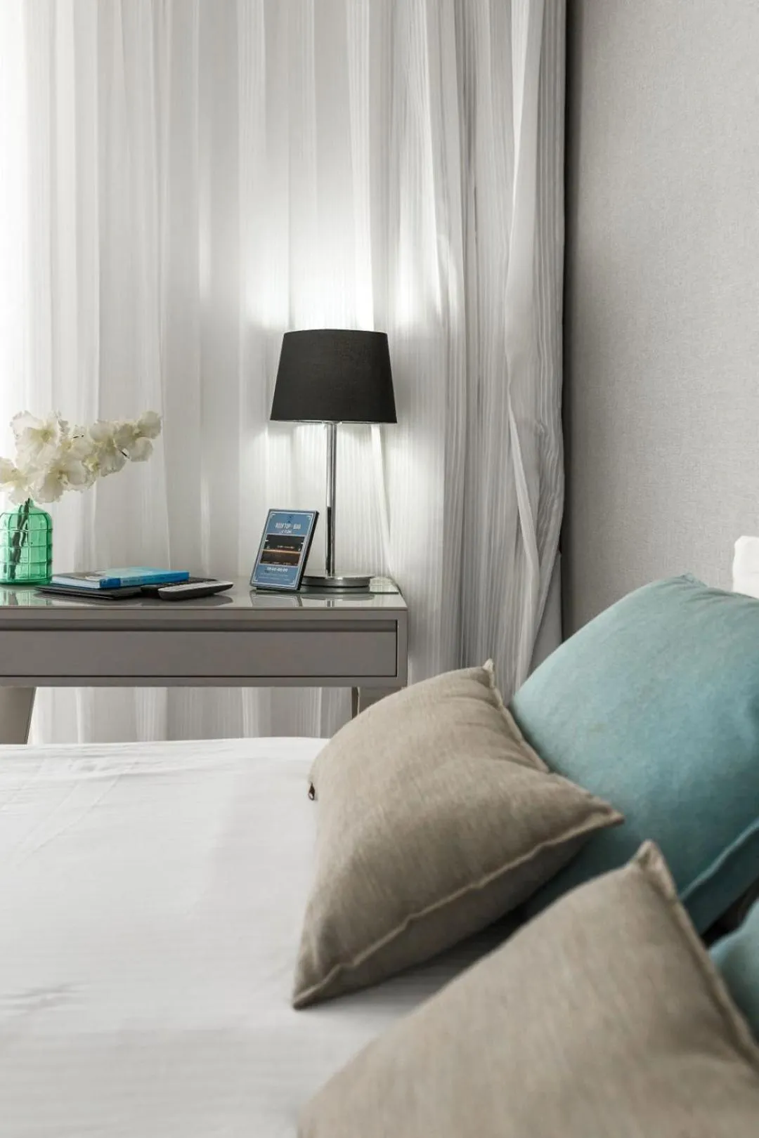 Bed in Kikar Boutique Hotel