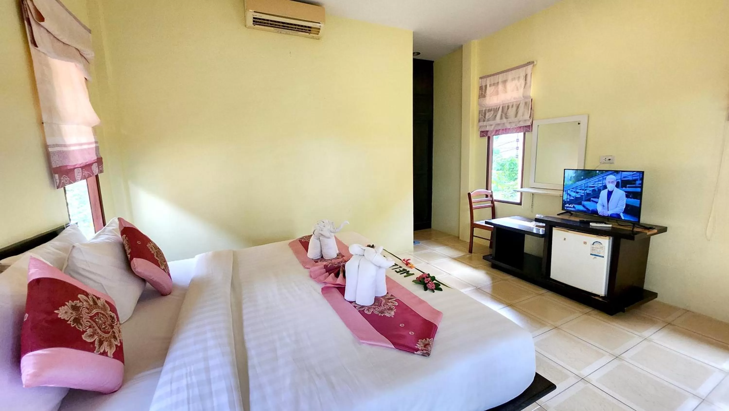 Bed in Sawaddee Aonang Resort