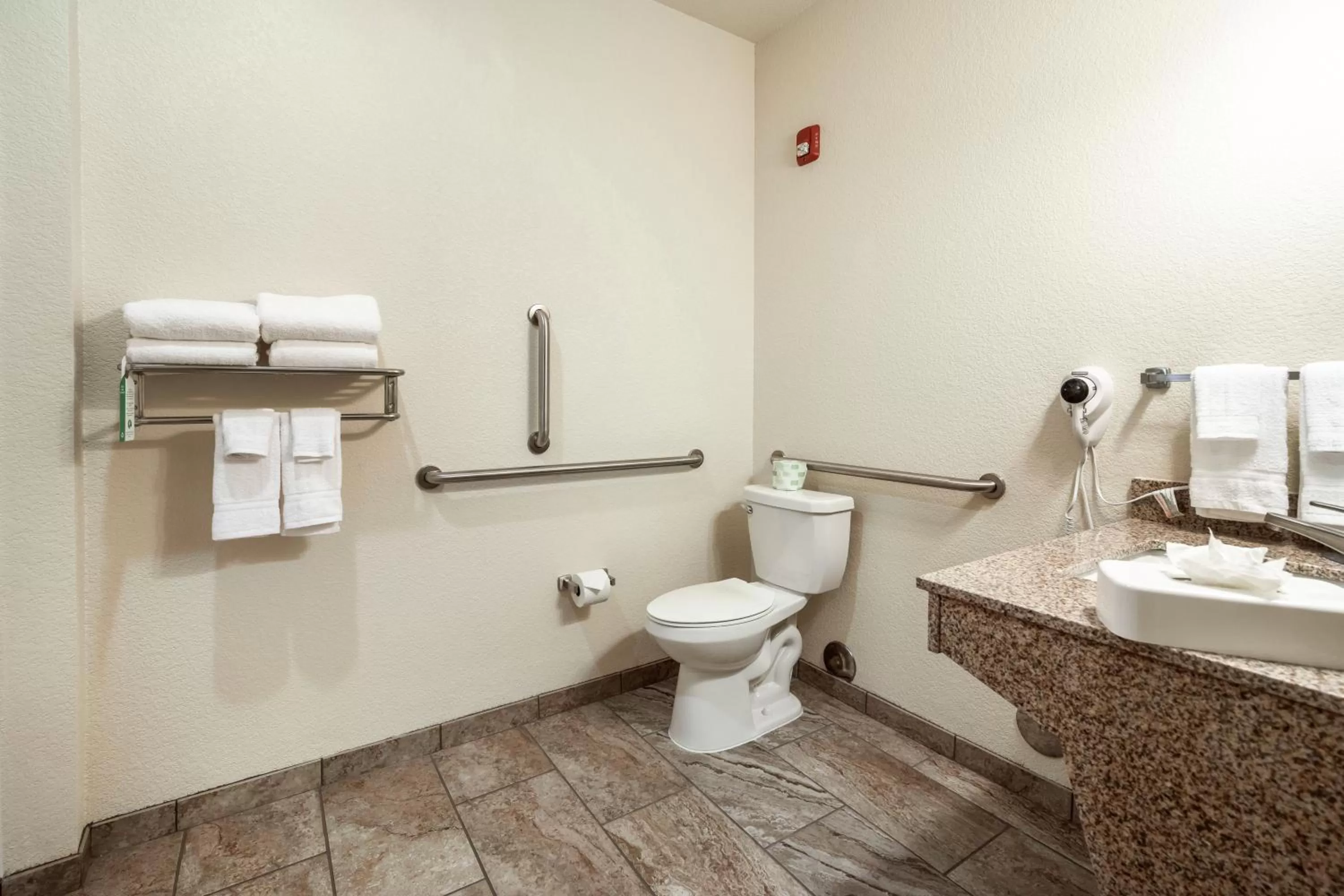 Toilet in Cobblestone Hotel & Suites - Hutchinson