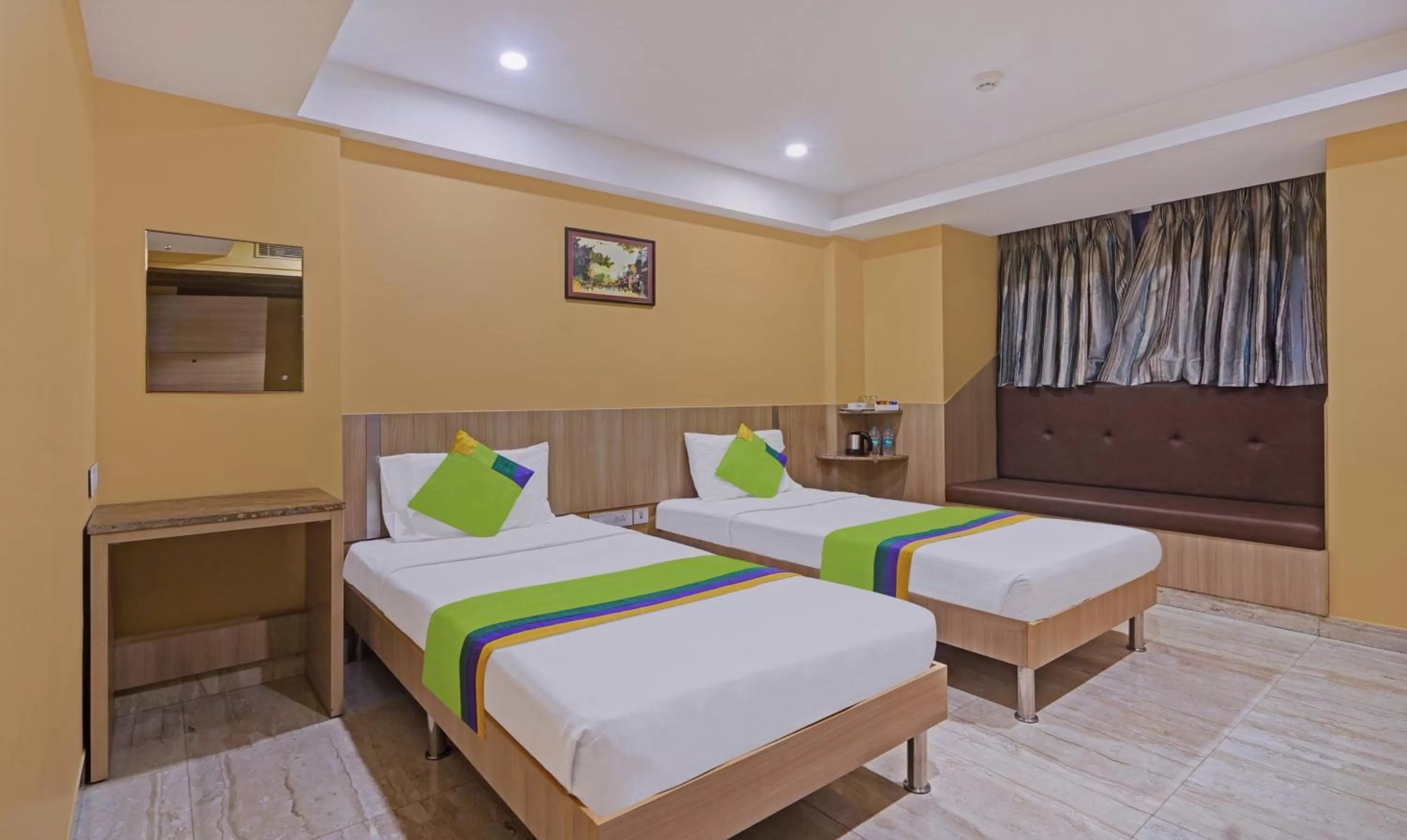 Bedroom, Bed in Treebo Fourth Avenue