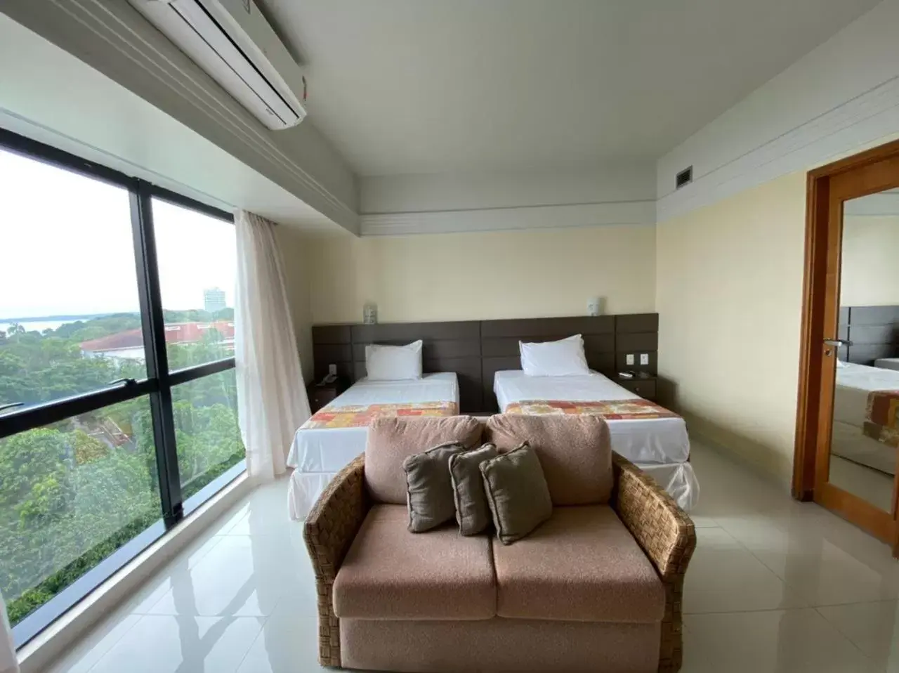 Standard Triple Room in Tropical Executive Hotel Standard Triple Room in Tropical Executive Hotel