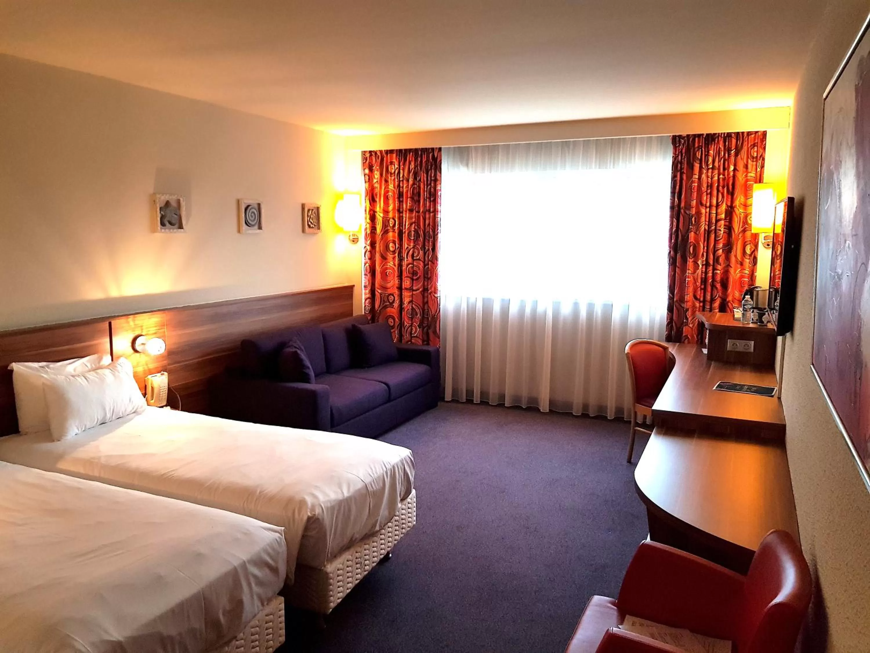 Bed in Kyriad Prestige Mulhouse - Basel