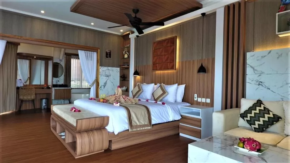 Photo of the whole room, Bed in SUITE OCEAN BLUE