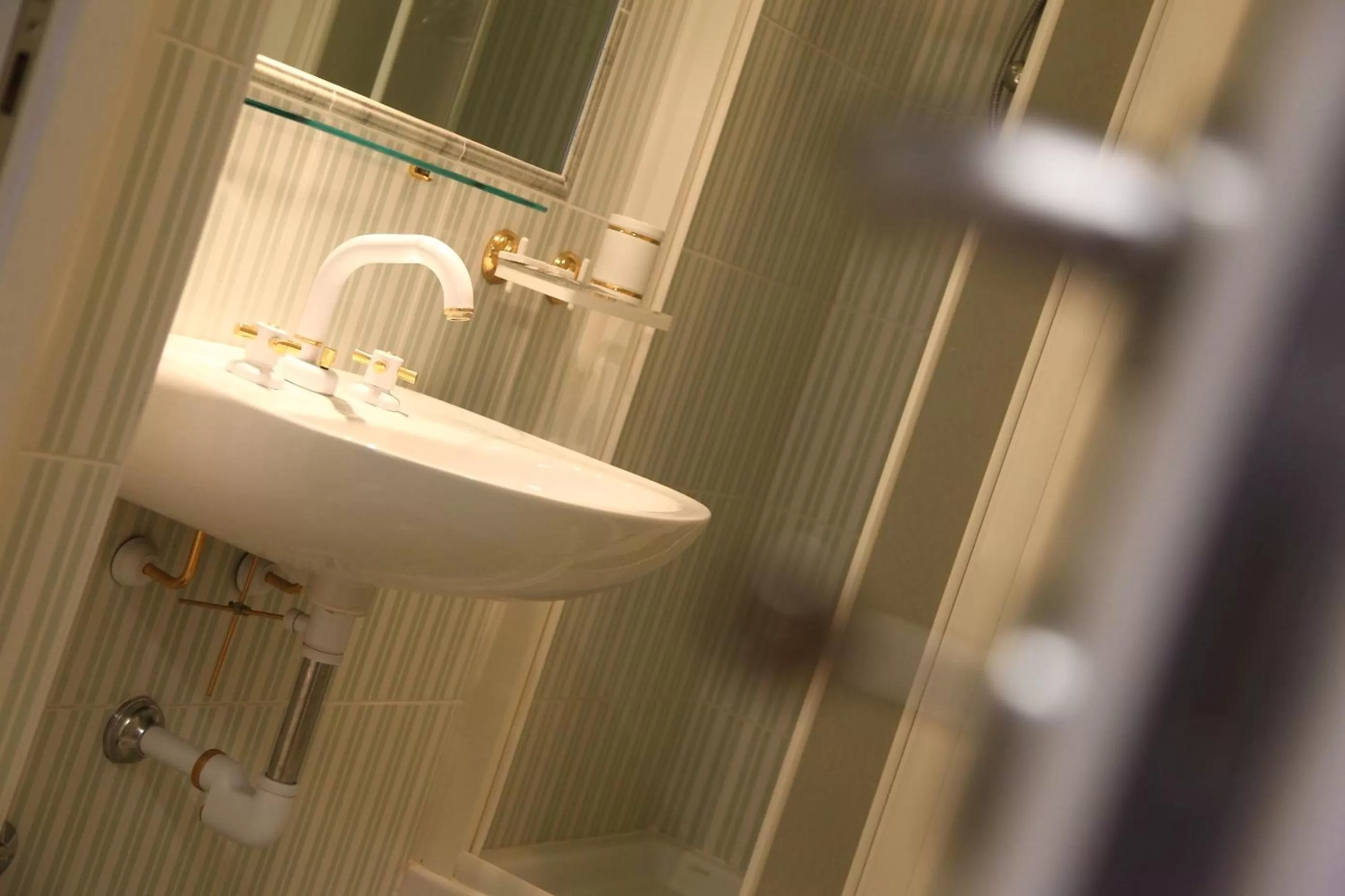 Bathroom in Hotel Le Ceramiche