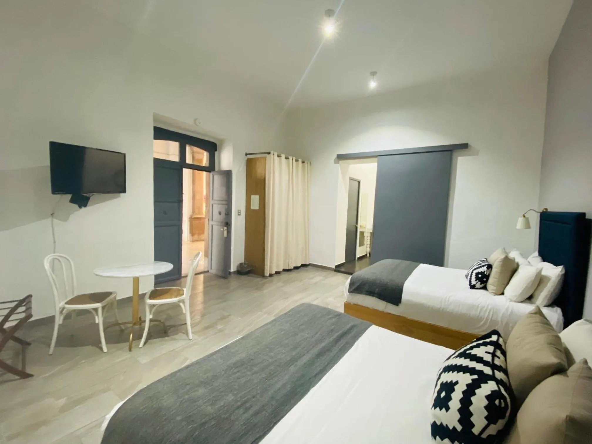 Photo of the whole room, Bed in Markee Hotel Boutique