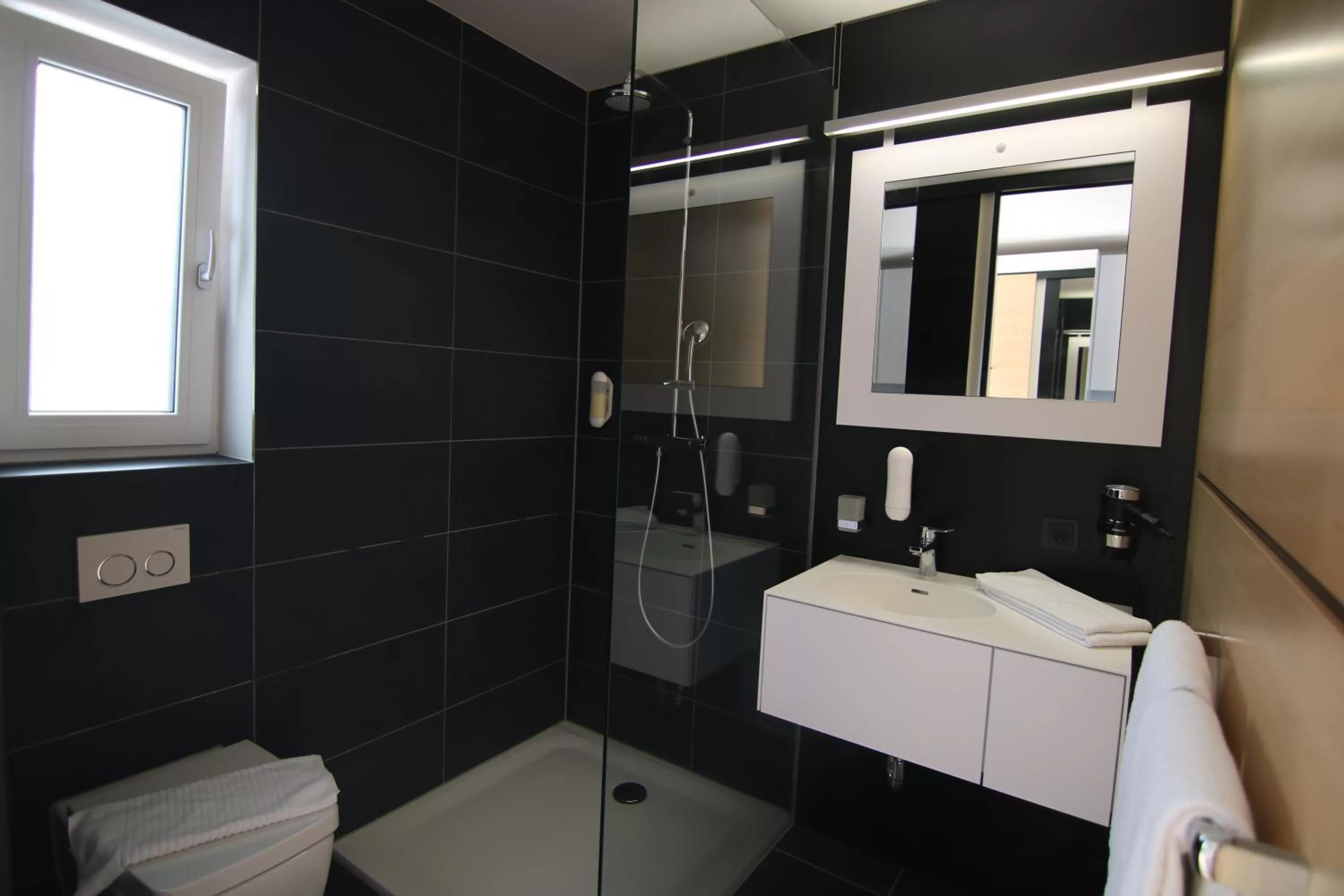 Property building, Bathroom in AI Hotel by WMM Hotels