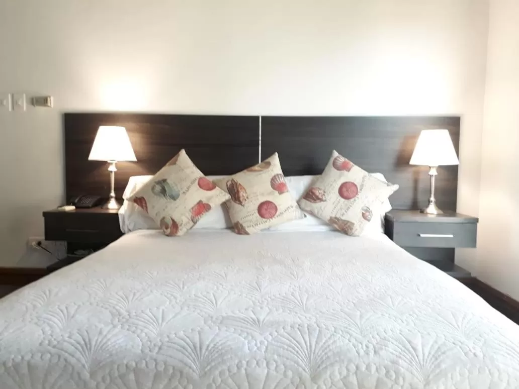 Bed in Porto Bello Hotel Boutique