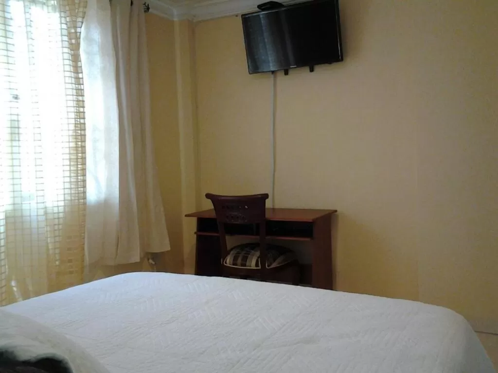 Bed in Suites La Rosa