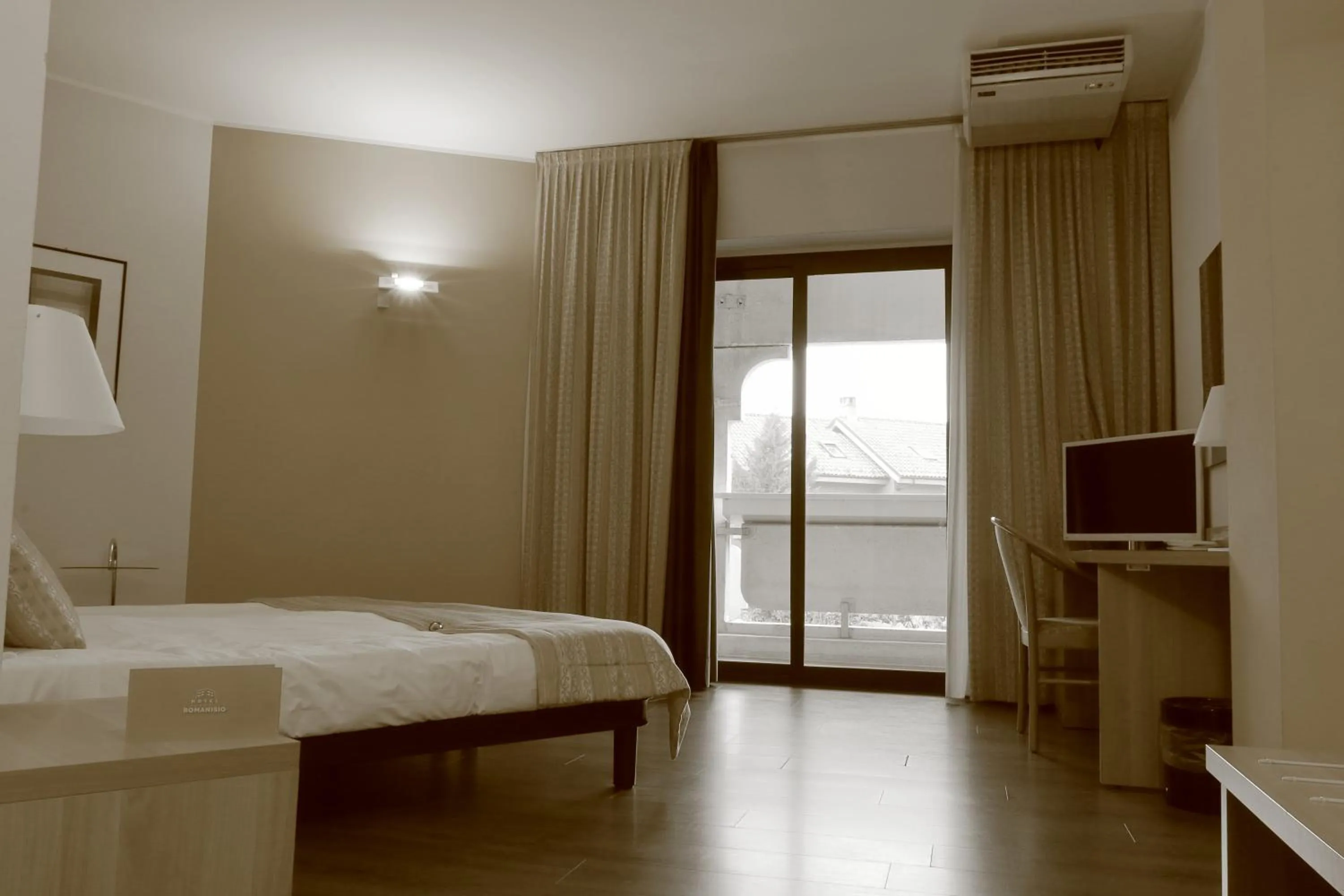 Bed in Hotel Romanisio