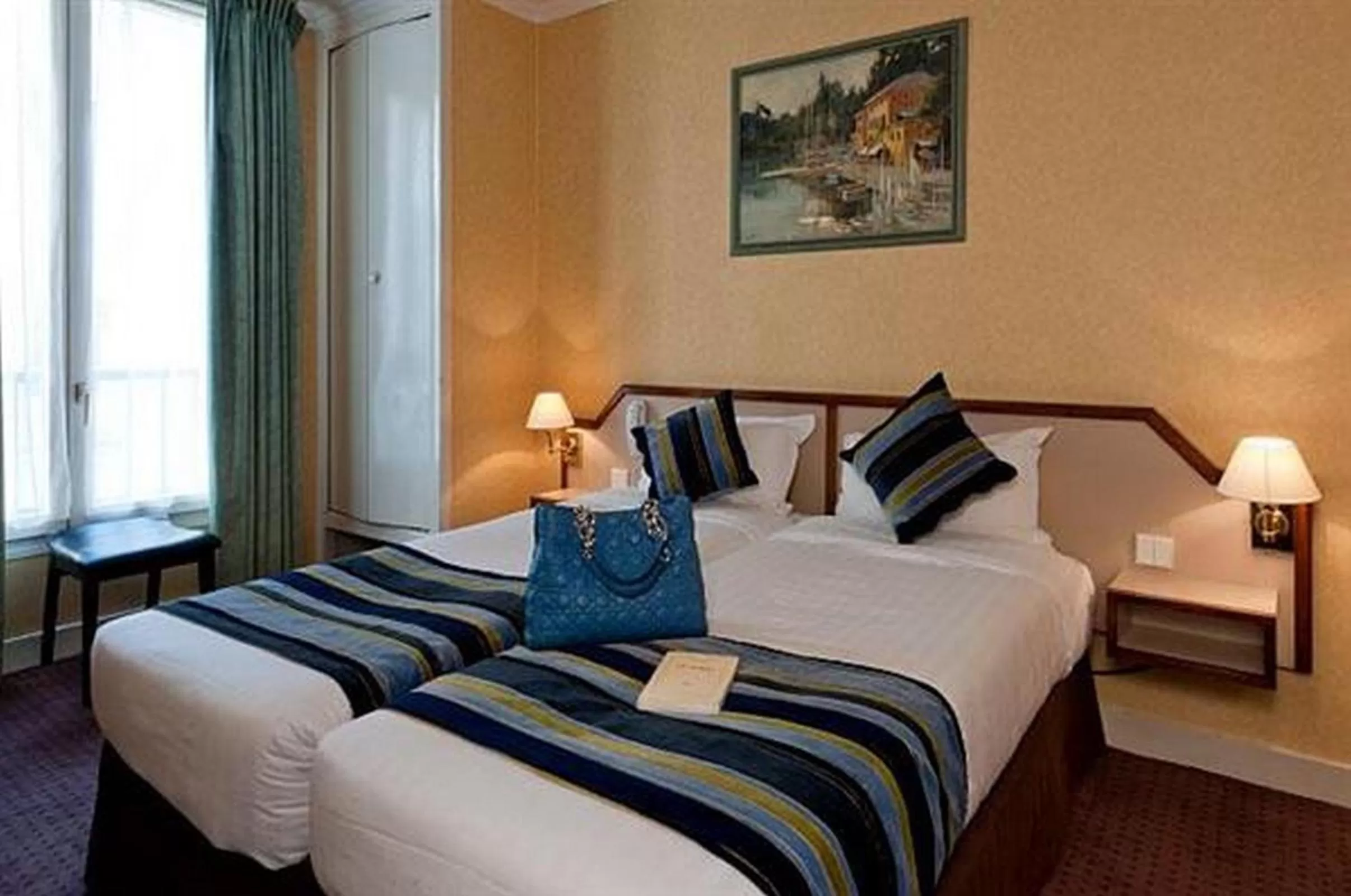 Bed in Hôtel Opera Deauville