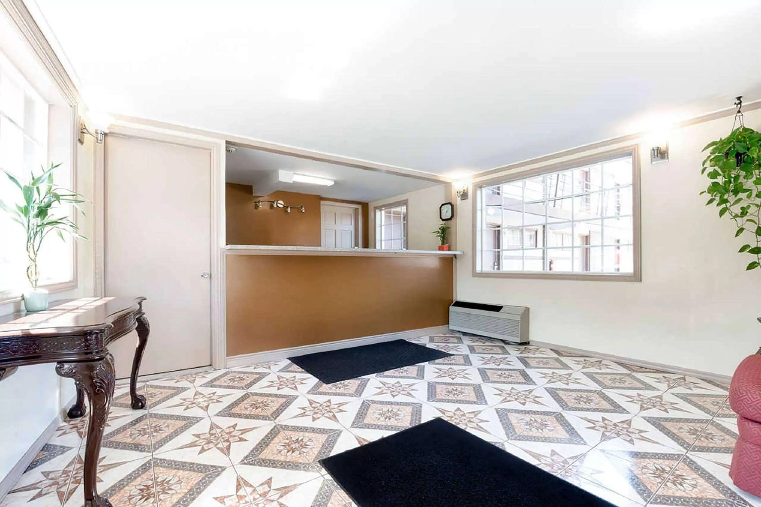 Lobby or reception in Super 8 by Wyndham Greensburg