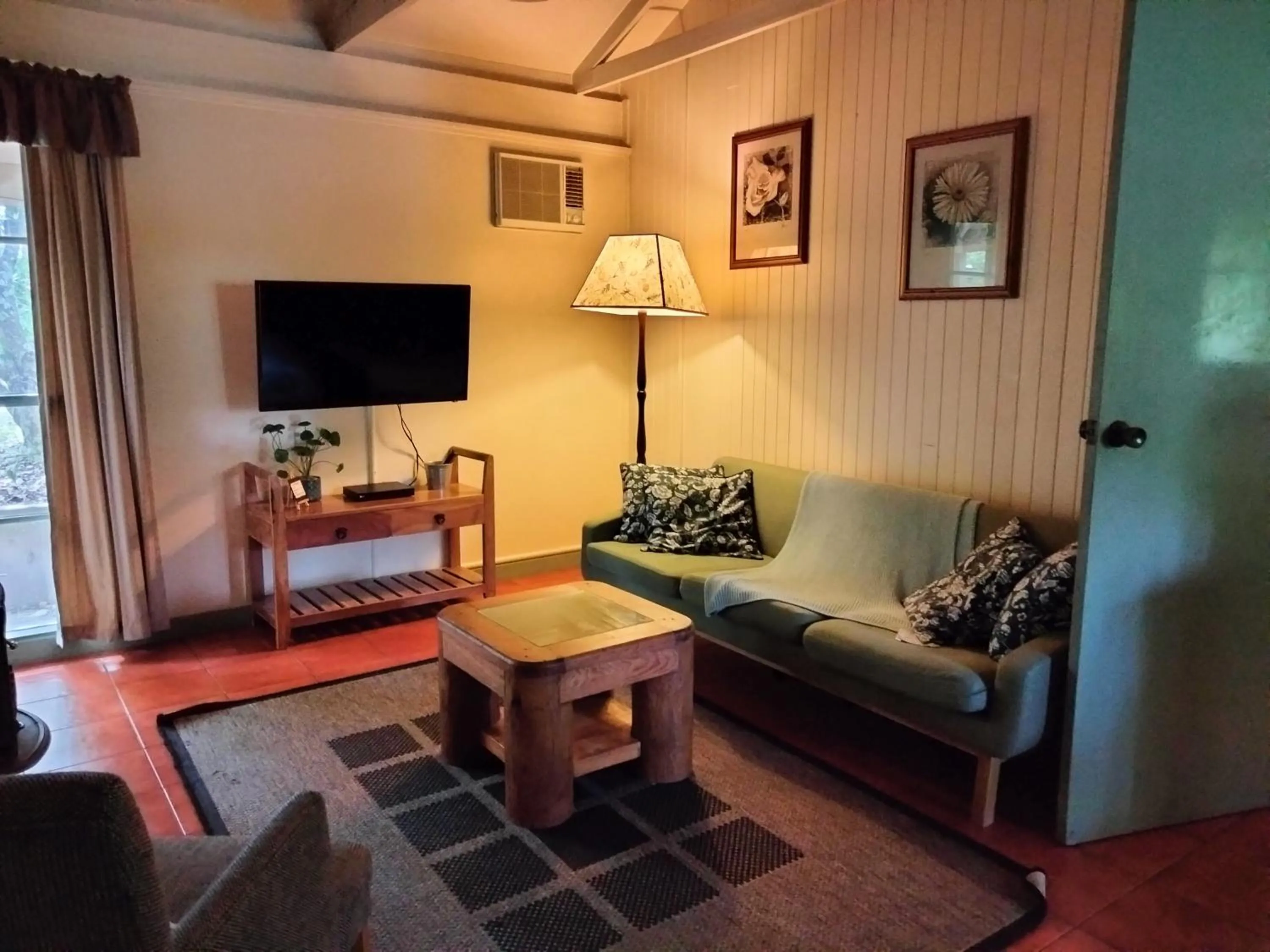 Living room in Kalimna Woods Cottages