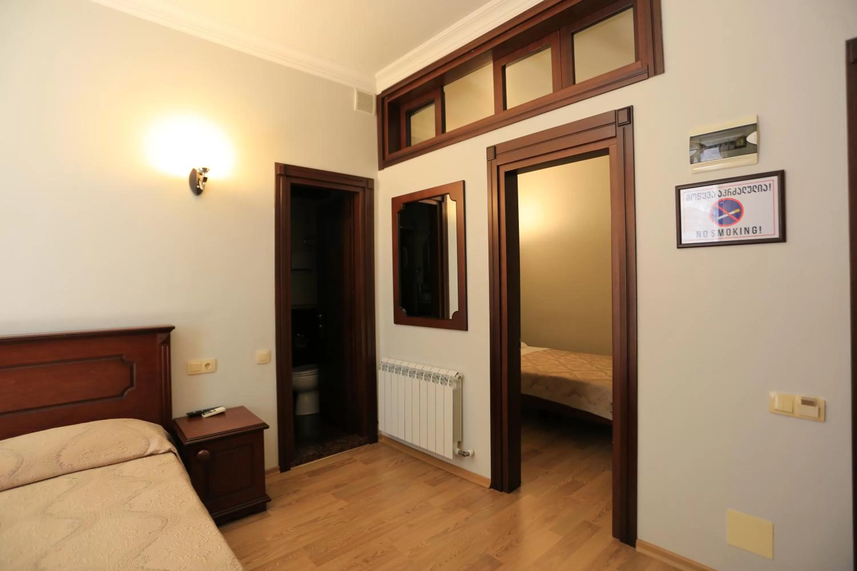 Bedroom, TV/Entertainment Center in Eiffel Hotel