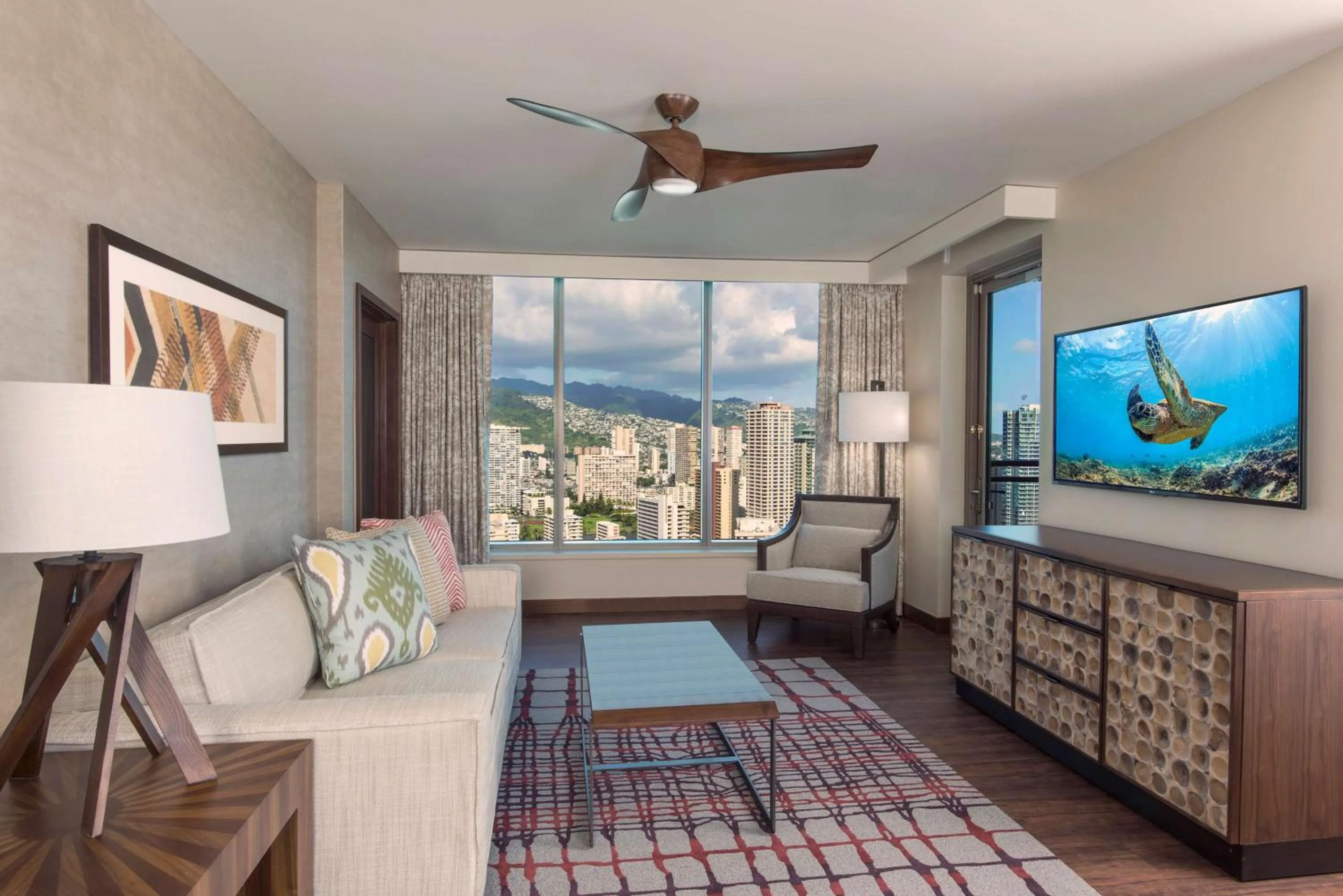 Living room in Hilton Grand Vacation Club The Grand Islander Waikiki Honolulu