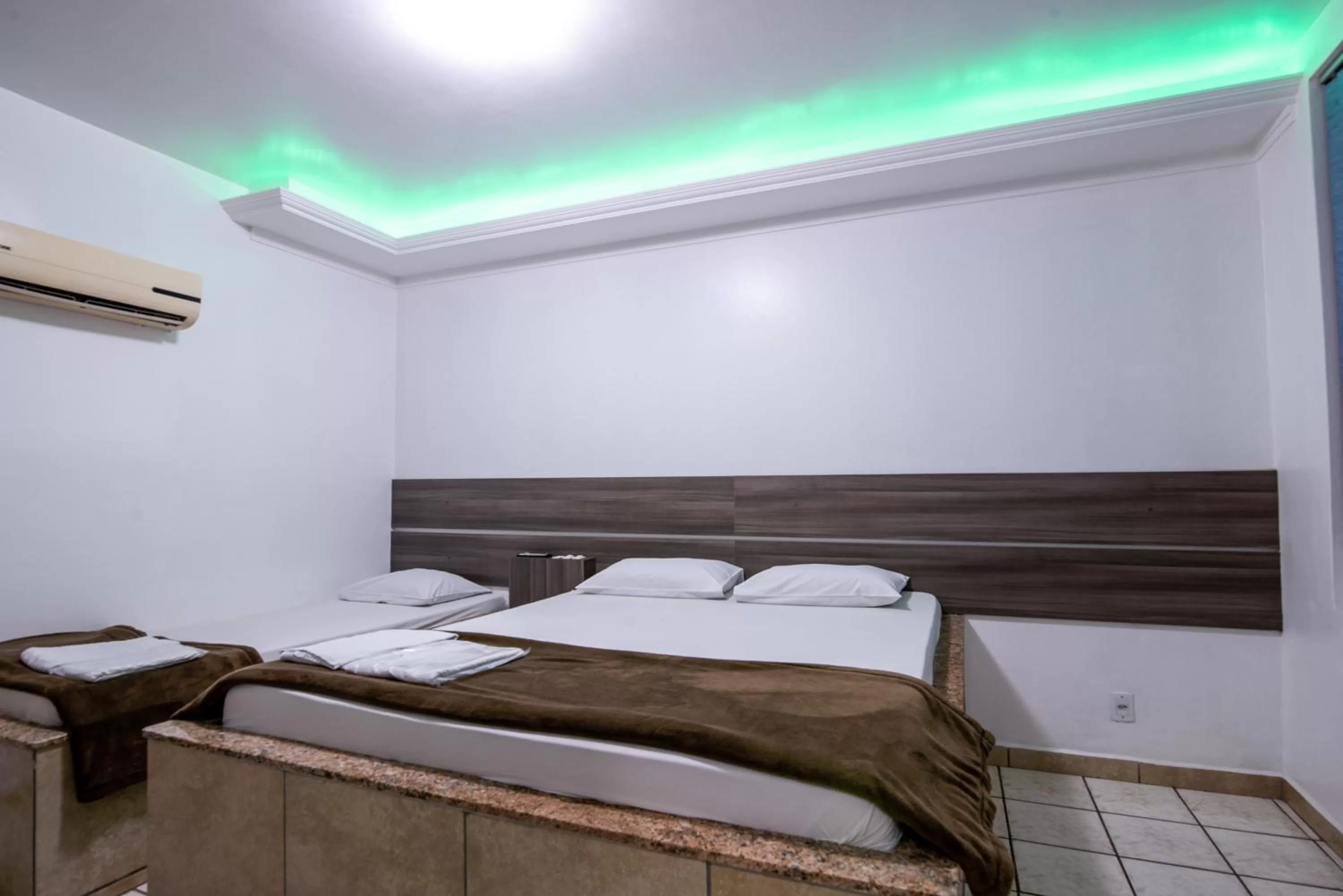 Bedroom in Classic Hotel e Motel