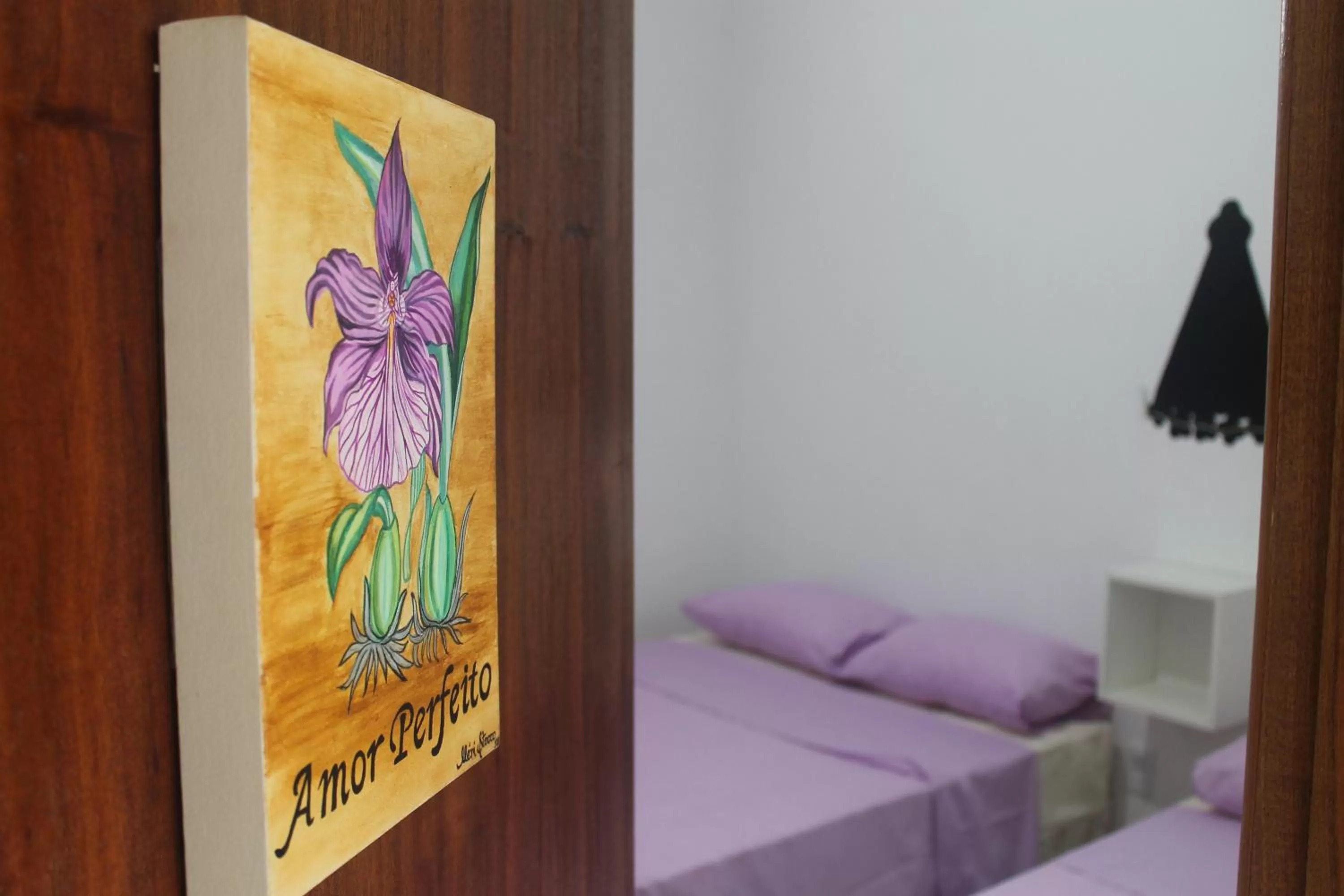 Bed in Pousada Orquideas de Maria